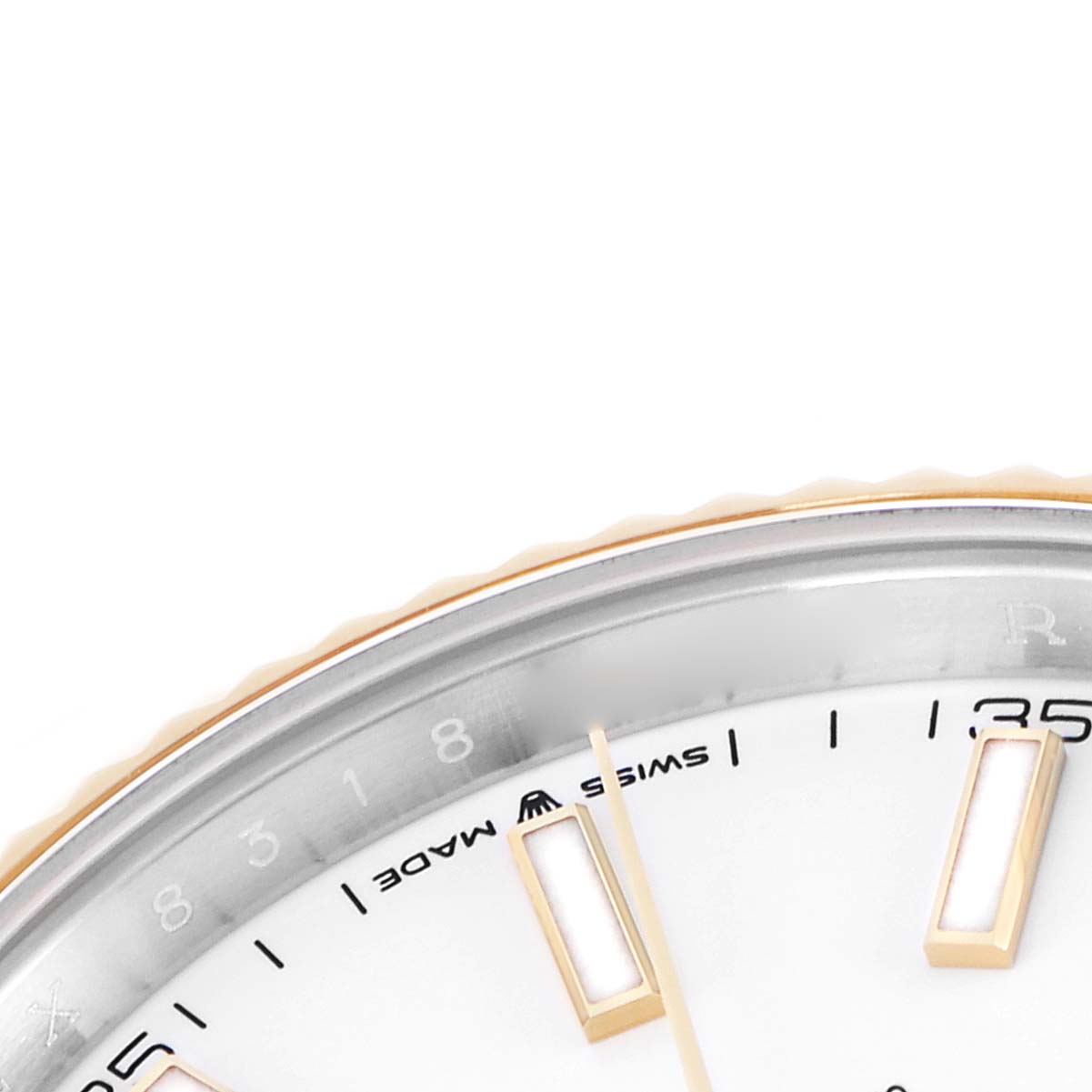The image shows a partial view of a Rolex Datejust 126333 Men
s Steel and Gold (two tone) White Dial watch, angled to display the dial edge, indices, and "Swiss Made" text.