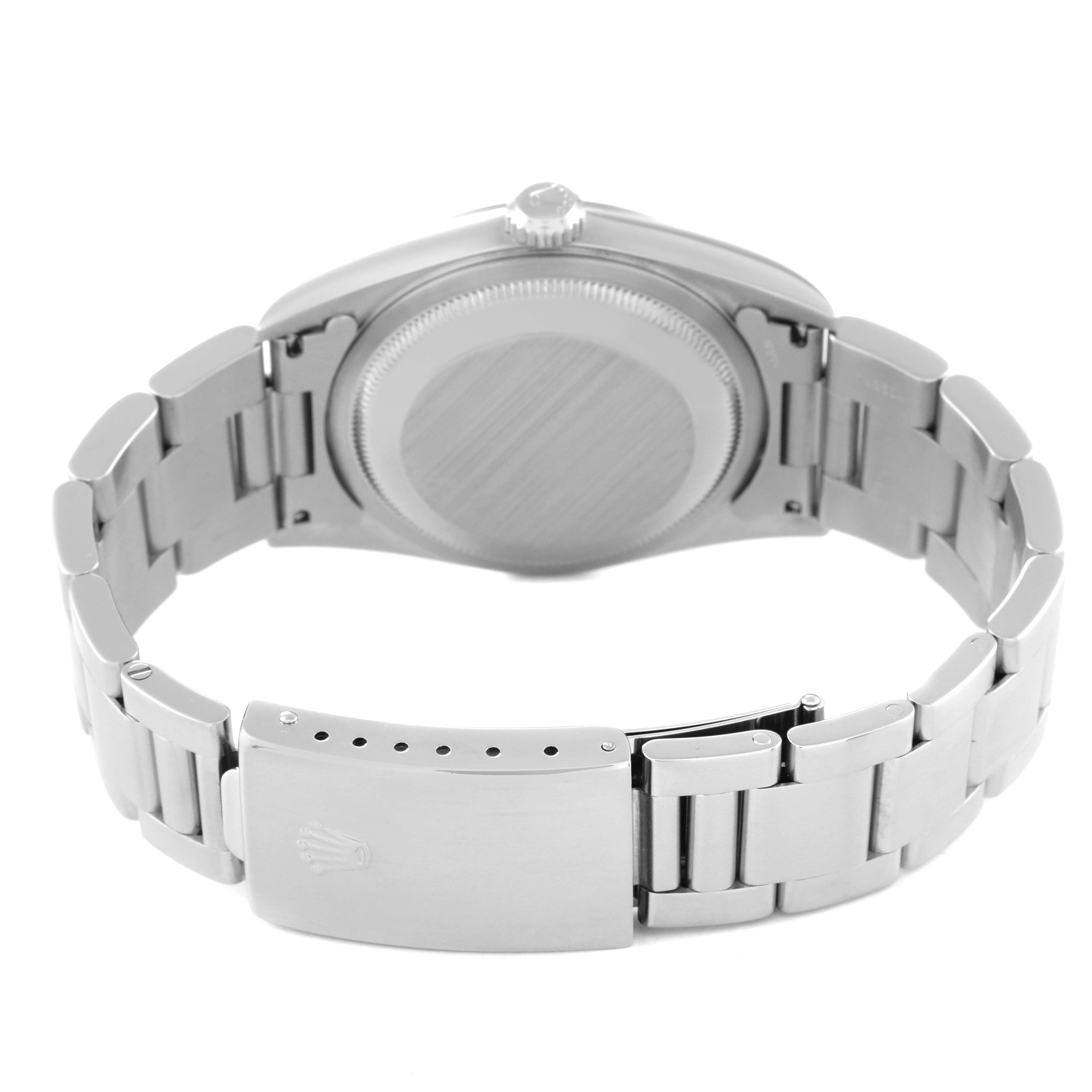 This image shows the rear view of a Rolex Datejust 16200 Men's Stainless Steel Blue Dial 16200 Men's Stainless Steel Blue Dial watch, highlighting the case back and the bracelet clasp.