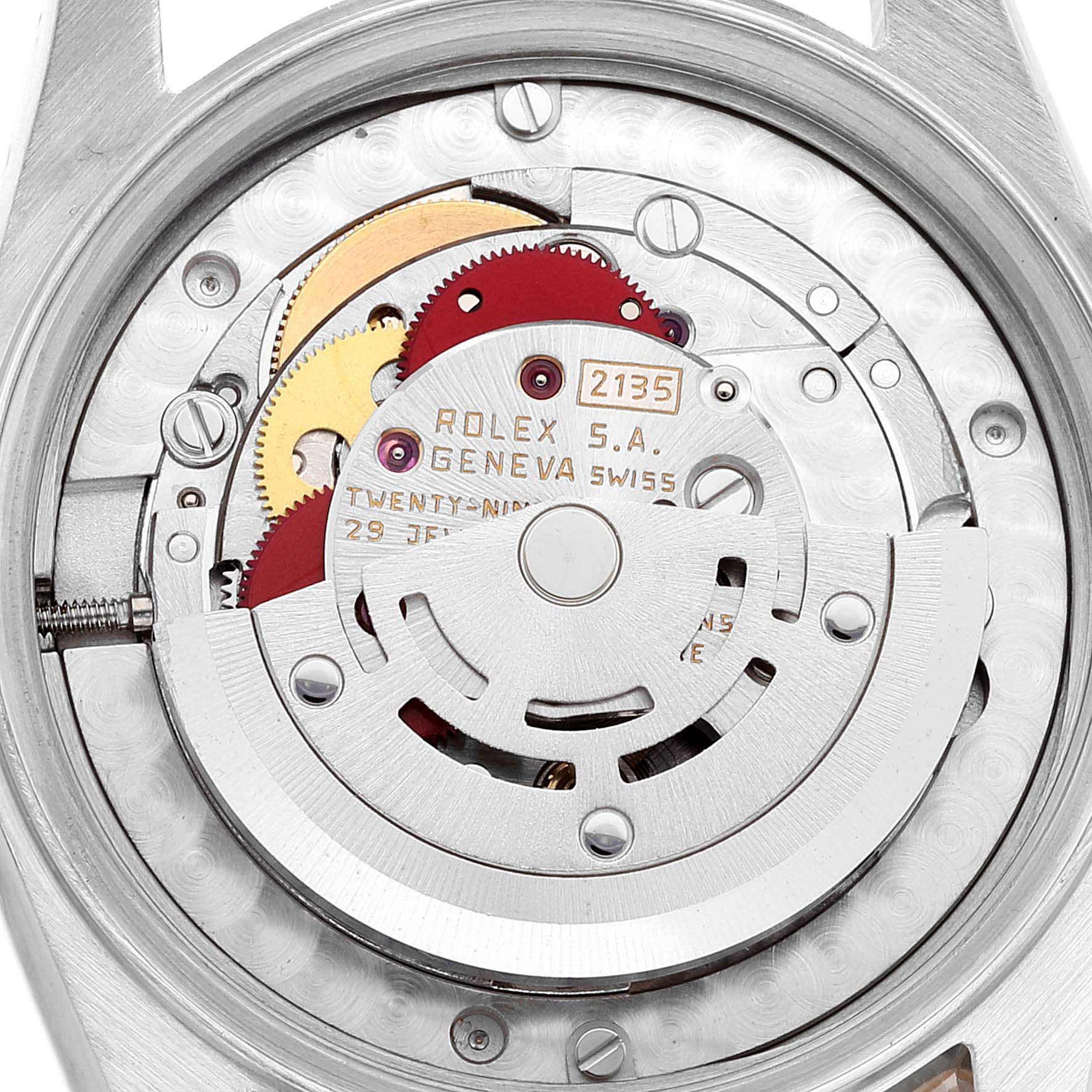 The image shows the rear view of the Rolex Mid-Size 68273 Women
s Steel and Gold (two tone) Champagne Dial 68273 Women
s Steel and Gold (two tone) Champagne Dial model, focusing on its exposed internal movement and gears.