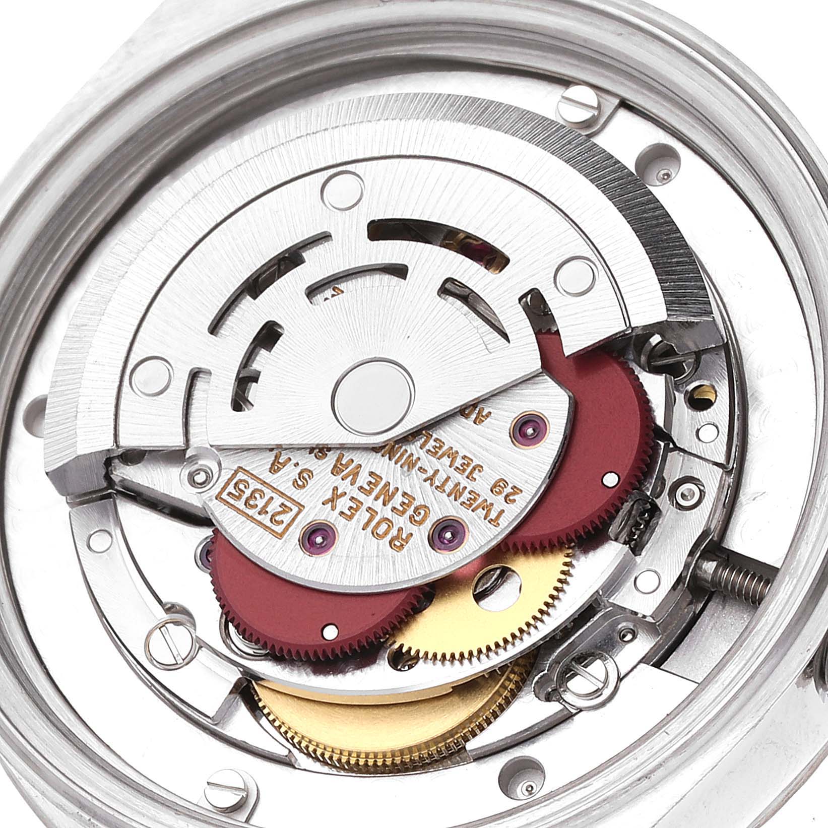 This image shows the intricate internal mechanism of a Rolex Mid-Size 68274 Women's Stainless Steel Pink Dial 68274 Women's Stainless Steel Pink Dial watch from a top-down angle.