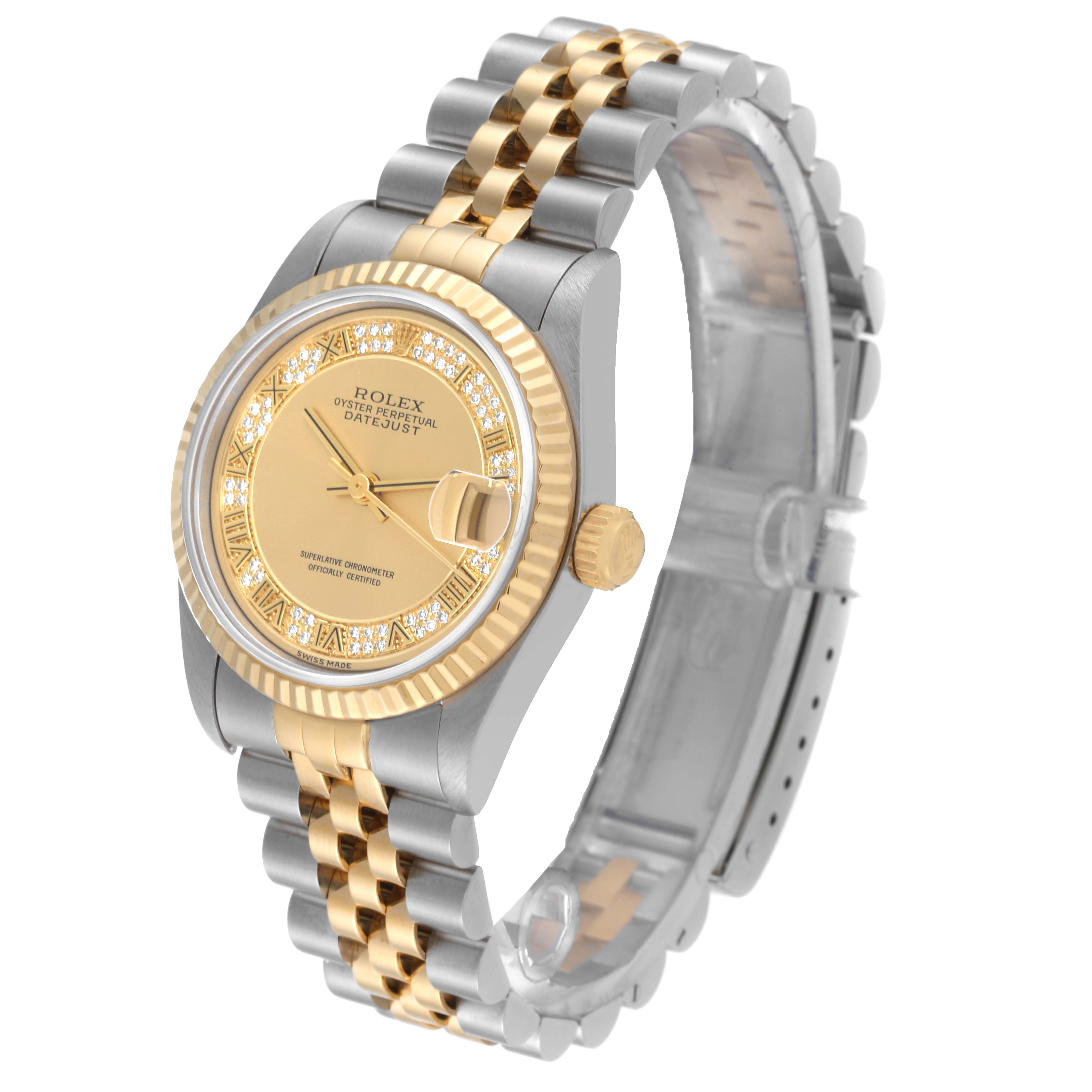 This image shows a Rolex Mid-Size 68273 Women's Steel and Gold (two tone) Champagne Dial 68273 Women's Steel and Gold (two tone) Champagne Dial Datejust watch at a slight angle, highlighting its dial, bezel, and two-tone bracelet.