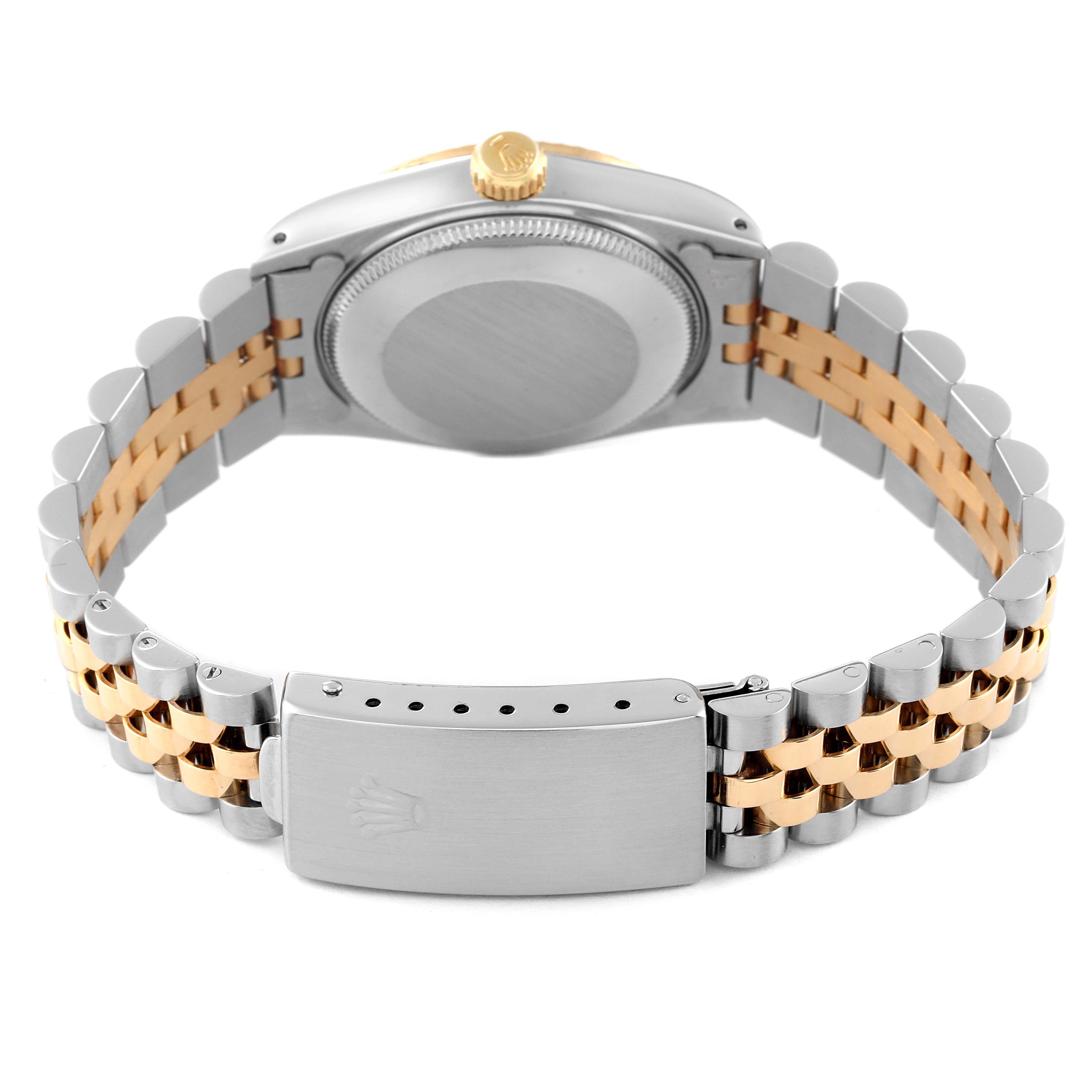 This image shows the back case, crown, and bracelet of a Rolex Mid-Size 68273 Women
s Steel and Gold (two tone) Champagne Dial 68273 Women
s Steel and Gold (two tone) Champagne Dial watch.