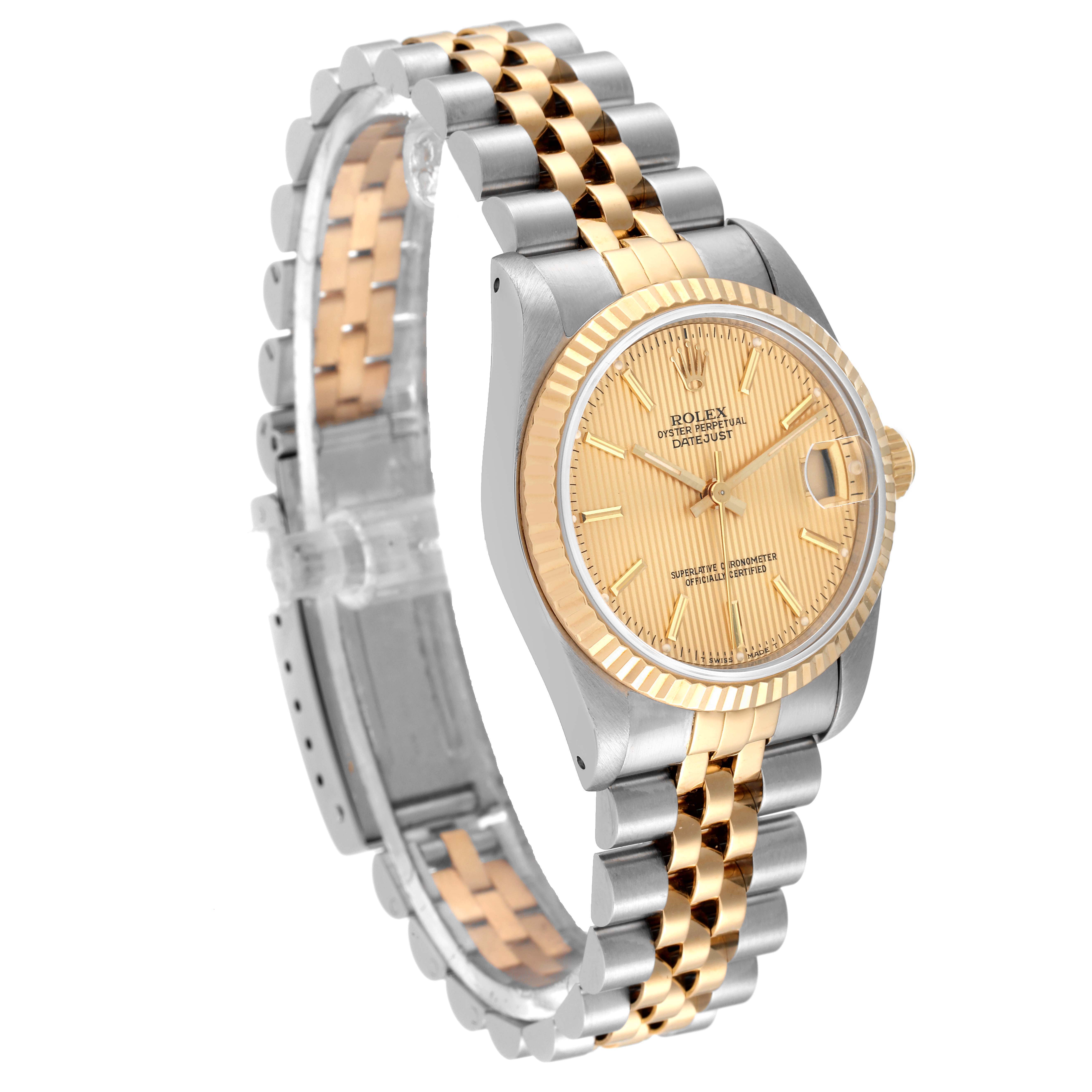 The image shows a Rolex Mid-Size 68273 Women
s Steel and Gold (two tone) Champagne Dial 68273 Women
s Steel and Gold (two tone) Champagne Dial Datejust watch at a three-quarter angle highlighting the gold and silver bracelet, bezel, and dial.