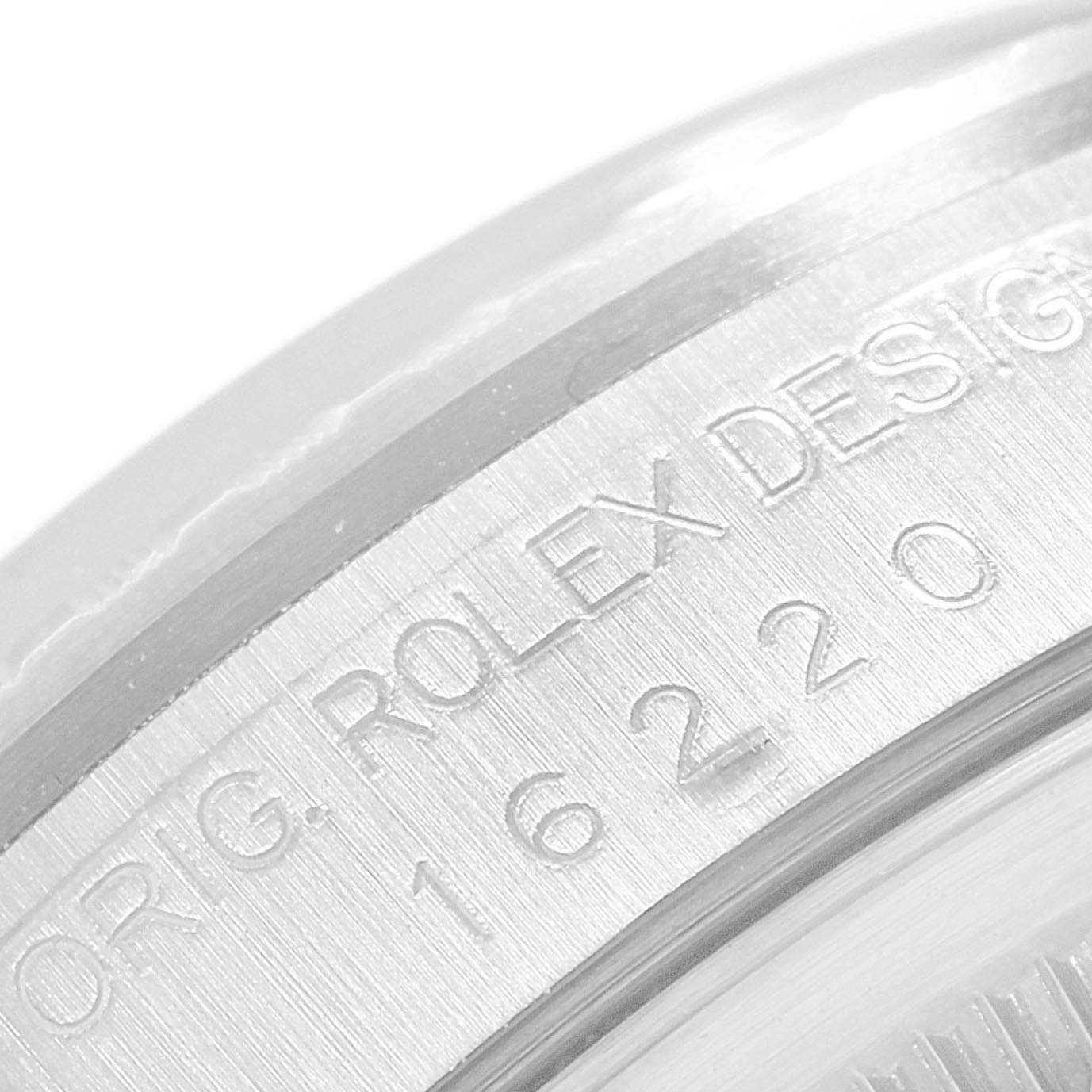 This image shows a close-up of the rim indicating the model "16220" and "Orig. Rolex Design" inscription of a Rolex Datejust 16220 Men's Stainless Steel Silver Dial 16220 Men's Stainless Steel Silver Dial watch.