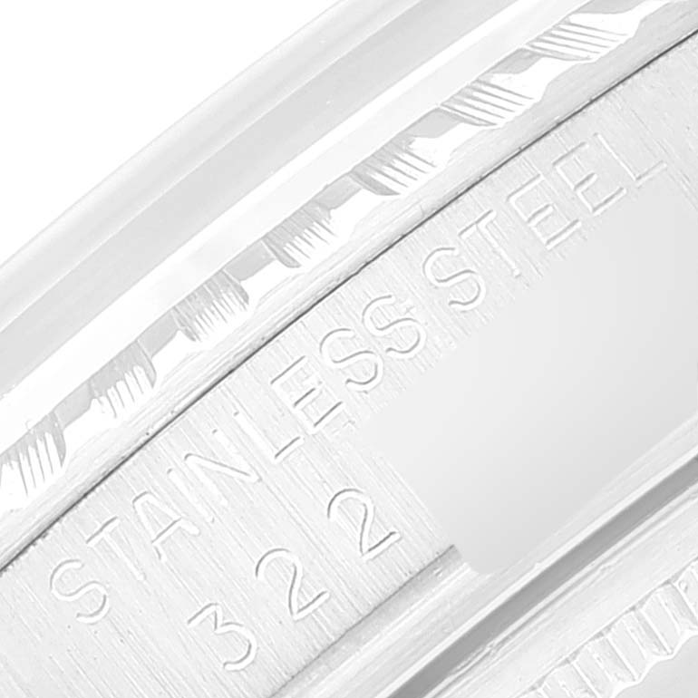 The image shows a close-up angle of the stainless steel engraving on the case back of a Rolex Vintage Collection 1603 Men's Stainless Steel Silver Dial 1603 Men's Stainless Steel Silver Dial watch.