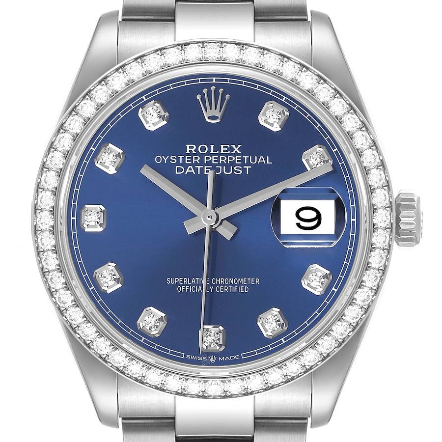 This image shows a Rolex Datejust watch with a blue dial, diamond hour markers, and a diamond-encrusted bezel, viewed from the front.