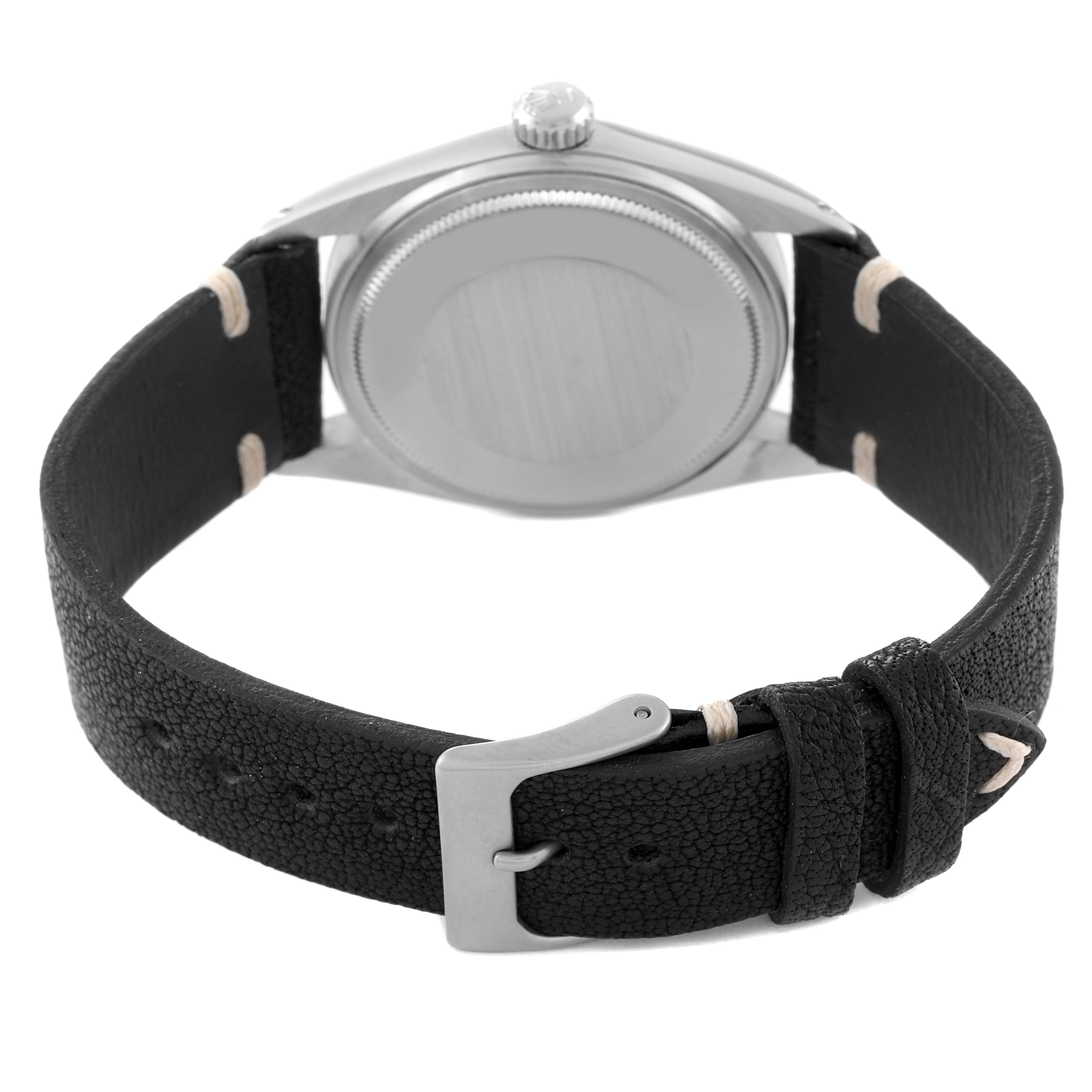 This image shows the back case and leather strap of the Rolex Vintage Collection 1601 Men's Stainless Steel Black Dial 1601 Men's Stainless Steel Black Dial model from a rear angle.