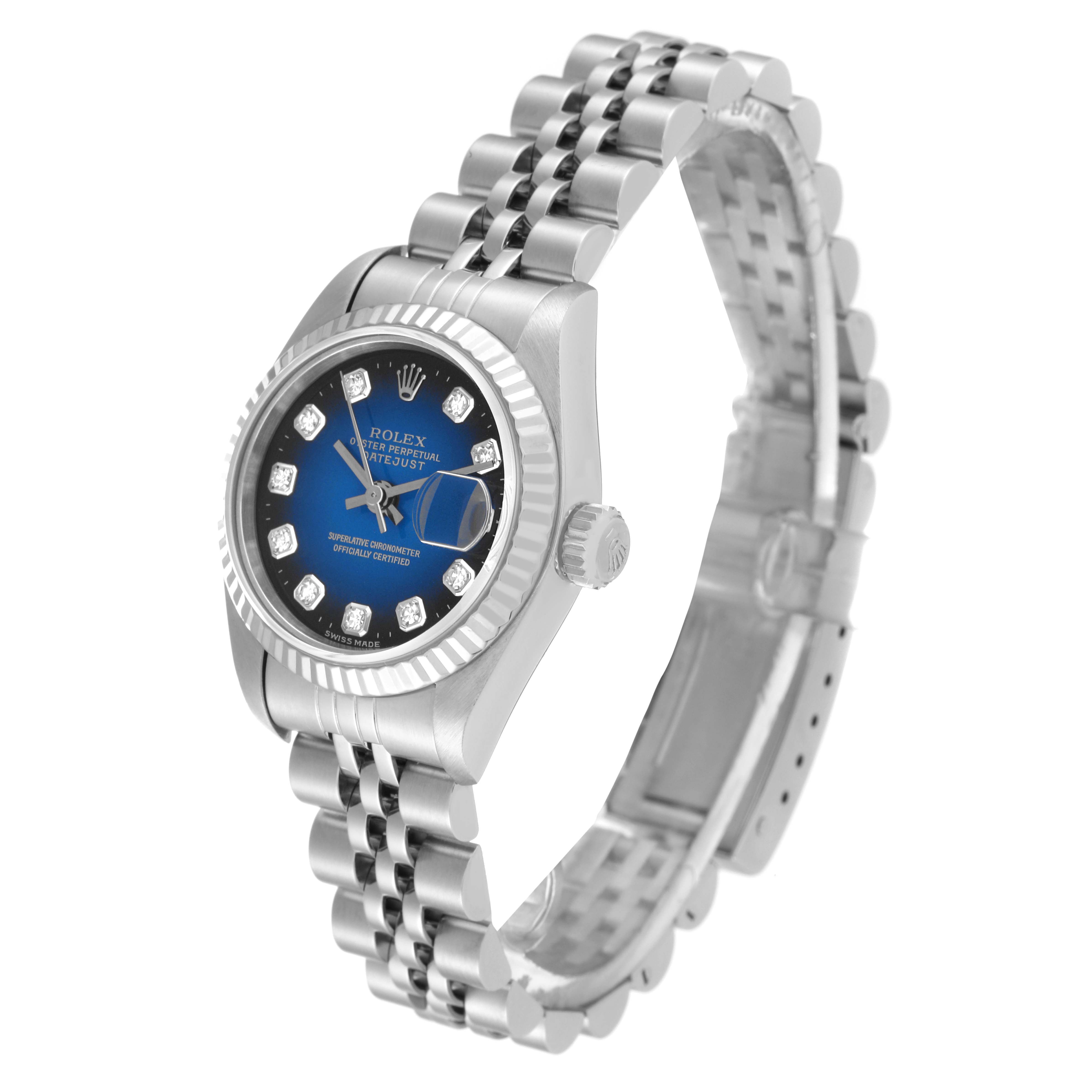 The image shows a Rolex Datejust 69174 Women's Stainless Steel Blue Dial 69174 Women's Stainless Steel Blue Dial watch from a side angle, highlighting the bezel, dial, crown, and Jubilee bracelet.