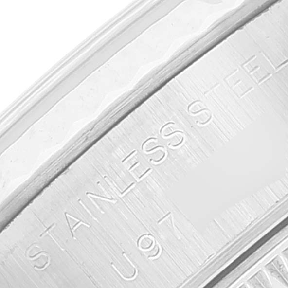 The image shows a close-up of the engraved "STAINLESS STEEL" marking on the case back of a Rolex Datejust 69174 Women's Stainless Steel Silver Dial 69174 Women's Stainless Steel Silver Dial watch.