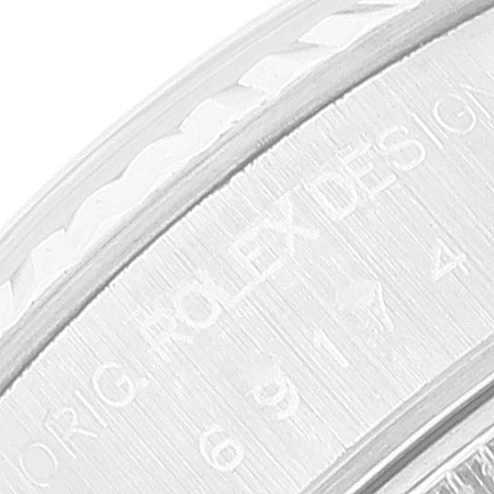 The image shows a close-up of the bezel and engraved lettering on a Rolex Datejust 69174 Women's Stainless Steel Silver Dial 69174 Women's Stainless Steel Silver Dial watch.