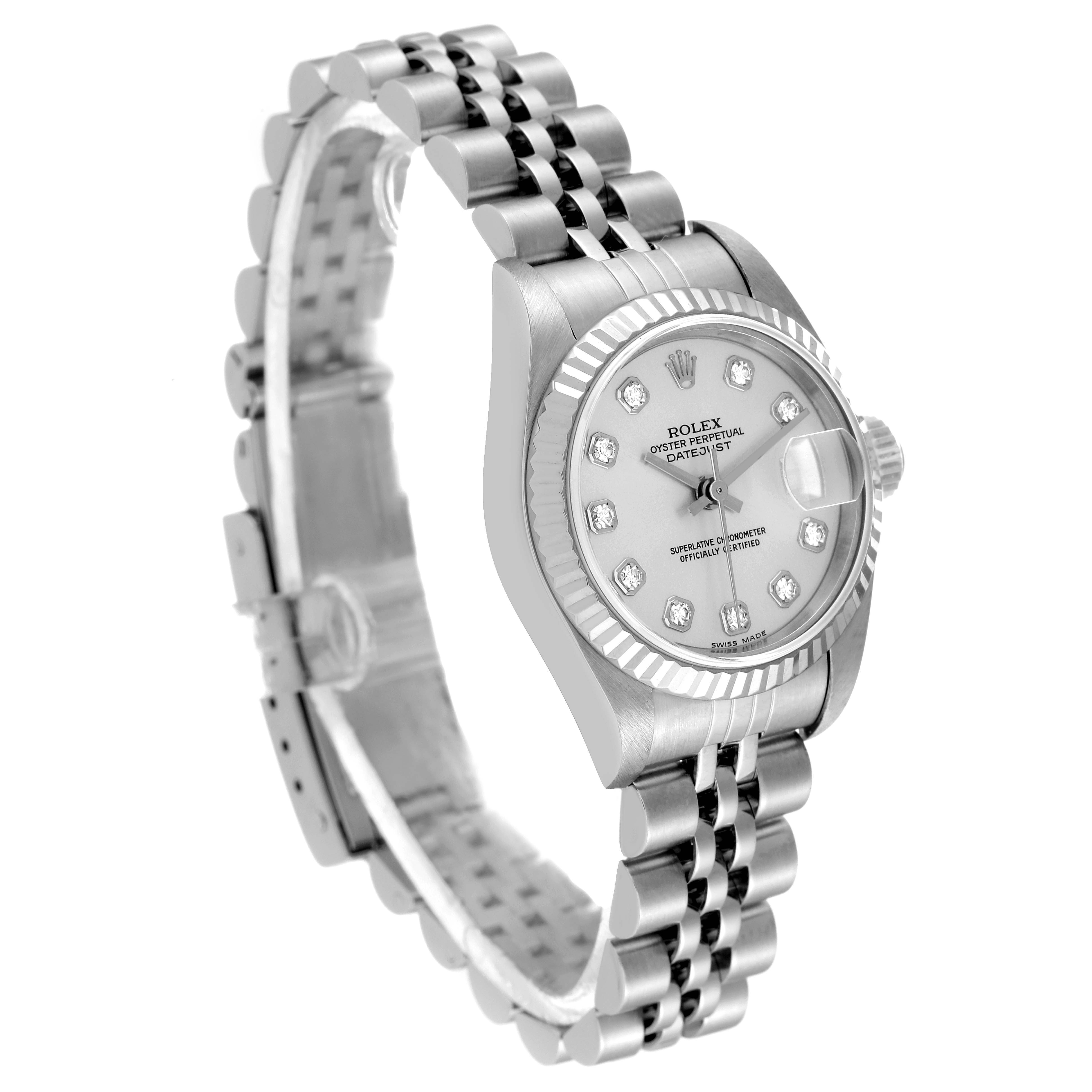 This is a Rolex Datejust 79174 Women's Stainless Steel Silver Dial 79174 Women's Stainless Steel Silver Dial watch shown at a three-quarter angle displaying its face, bracelet, and fluted bezel.