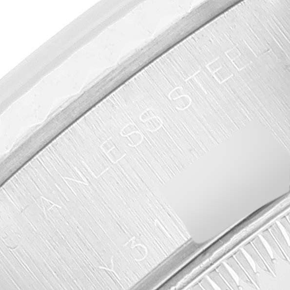 The image shows a close-up of the stainless steel engraving on the case back of the Rolex Datejust 79174 Women's Stainless Steel Silver Dial 79174 Women's Stainless Steel Silver Dial model watch.