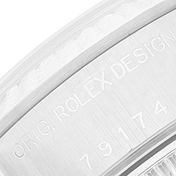 This image shows a close-up of the case back engraving on a Rolex Datejust 79174 Women's Stainless Steel Silver Dial 79174 Women's Stainless Steel Silver Dial watch.