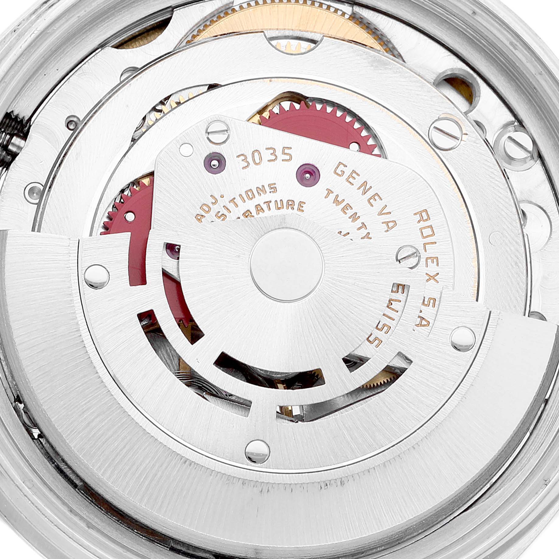 This image shows the inner mechanical movement of a Rolex Datejust 16014 Men's Stainless Steel White Dial 16014 Men's Stainless Steel White Dial model, displaying gears and engravings.