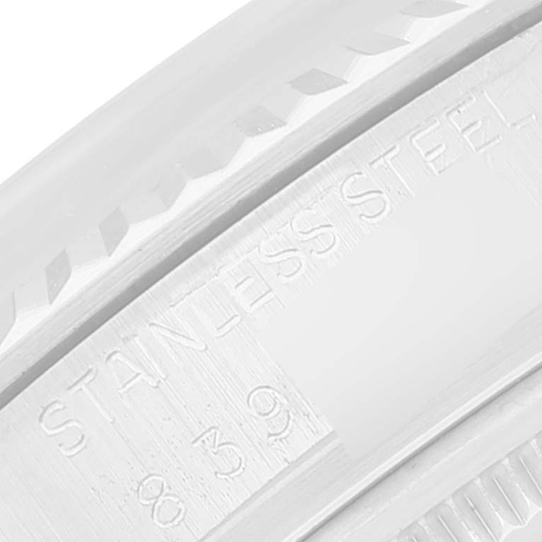 This is a close-up image showing the stainless steel engraving on the inner bezel of a Rolex Datejust 16014 Men's Stainless Steel White Dial 16014 Men's Stainless Steel White Dial watch.