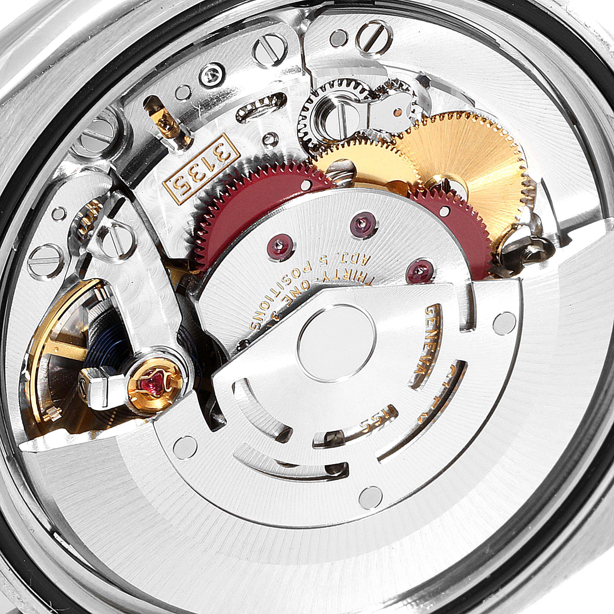 This is an internal view of the Rolex Datejust 116234 Men's Stainless Steel Silver Dial 116234 Men's Stainless Steel Silver Dial watch movement, showing gears and mechanical components.