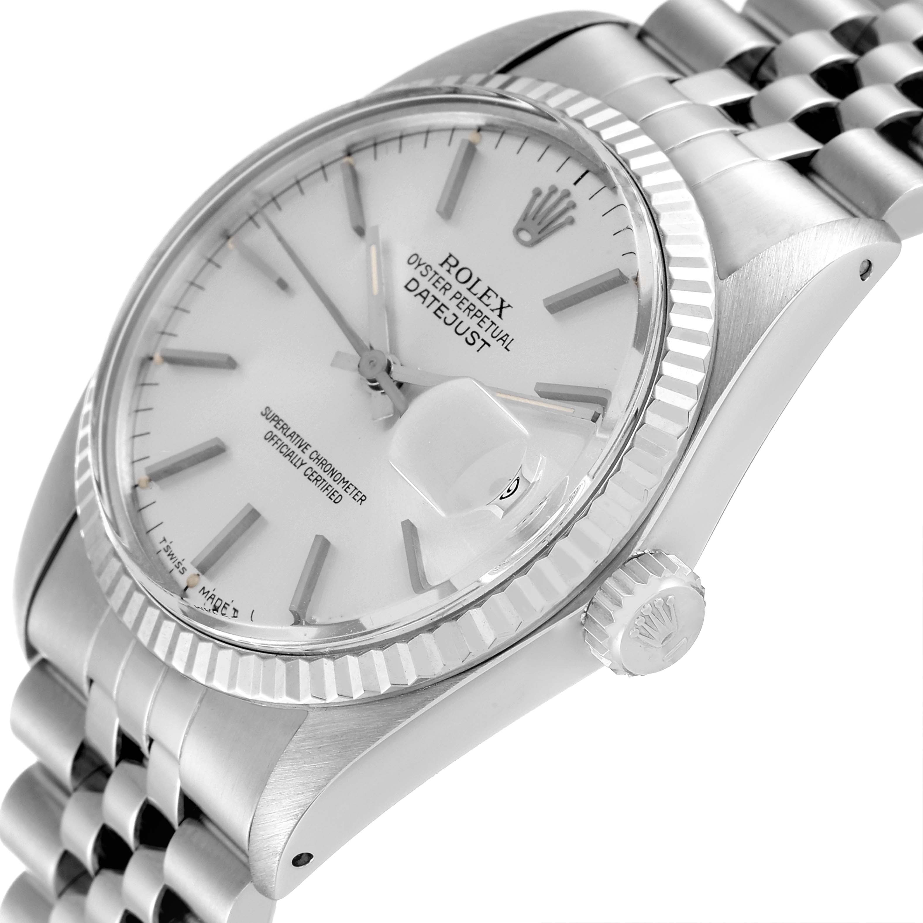 The image shows a close-up view of a Rolex Vintage Collection 16014 Men's Stainless Steel Silver Dial 16014 Men's Stainless Steel Silver Dial Oyster Perpetual Datejust, highlighting the dial, bezel, and crown.