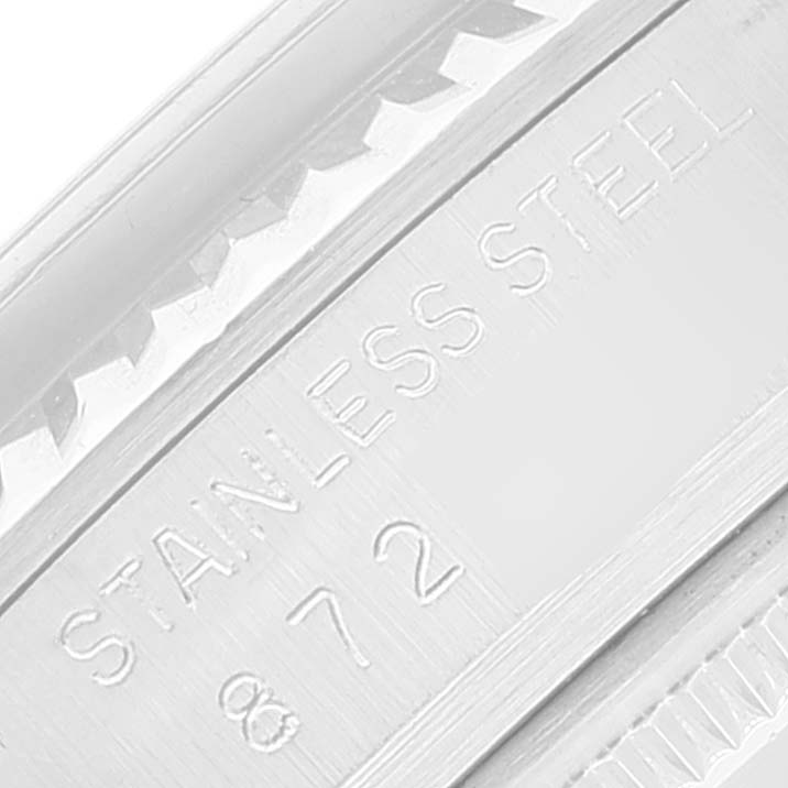 This image shows a close-up of the stainless steel engraving on the case back of a Vintage Collection model by Rolex.