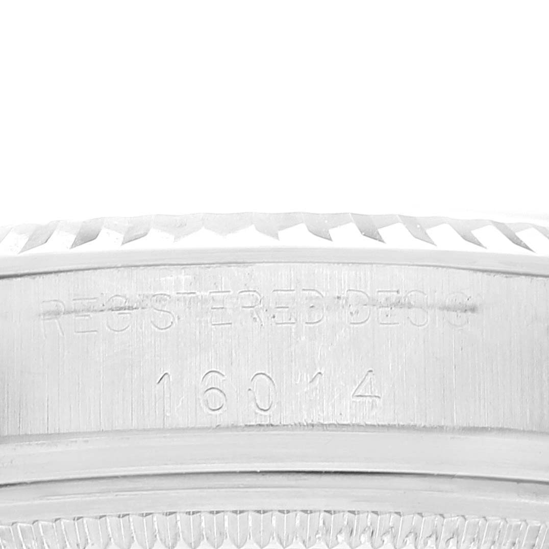 The image shows a close-up of the case side and bezel of a Rolex Vintage Collection 16014 Men's Stainless Steel Silver Dial 16014 Men's Stainless Steel Silver Dial model, showcasing the model number "16014."