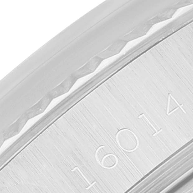 This image shows a close-up of the case with model number engraving on a Rolex Datejust 16014 Men
s Stainless Steel Silver Dial 16014 Men
s Stainless Steel Silver Dial watch.