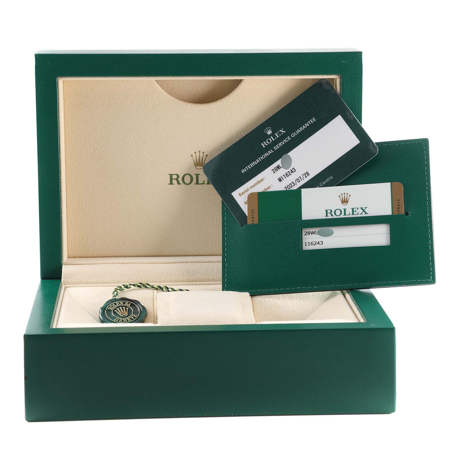 The image shows a Rolex Datejust 116243 Men's Steel and Gold (two tone) Black Dial 116243 Men's Steel and Gold (two tone) Black Dial watch box, authenticity card, and a green tag, photographed from the front.