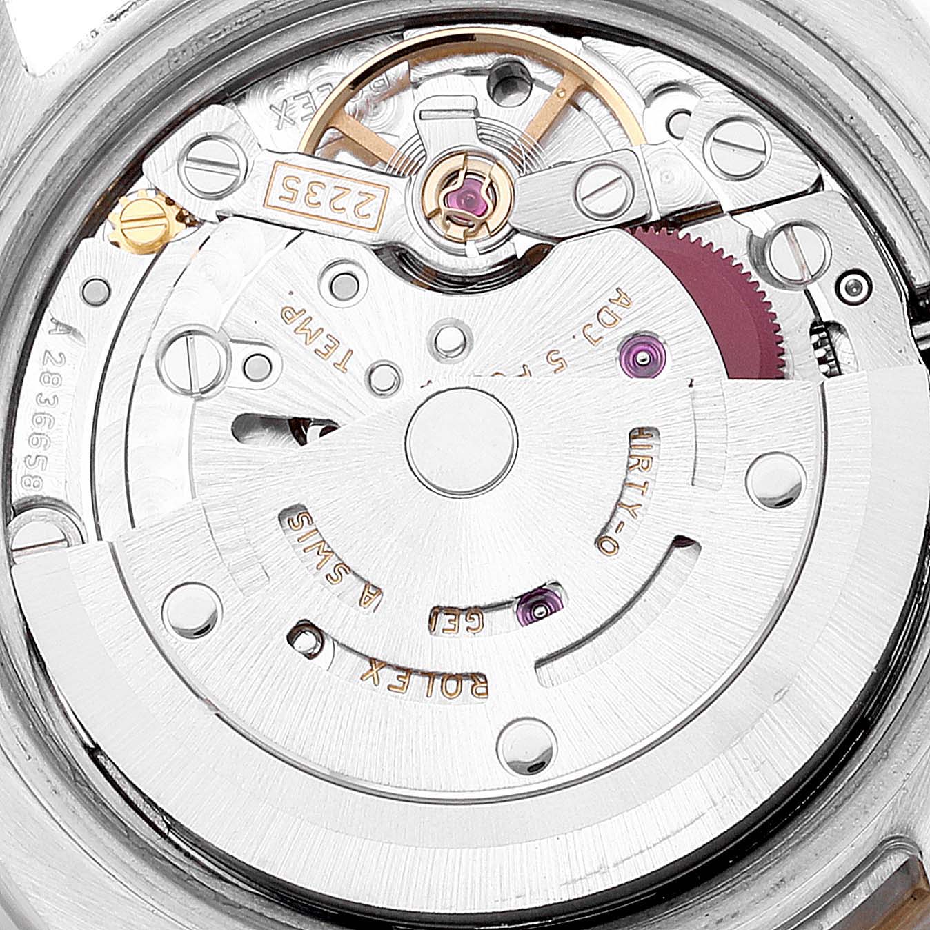 This image shows a close-up of the movement mechanism inside a Rolex Datejust 179173 Women's Steel and Gold (two tone) Beige Dial 179173 Women's Steel and Gold (two tone) Beige Dial watch.