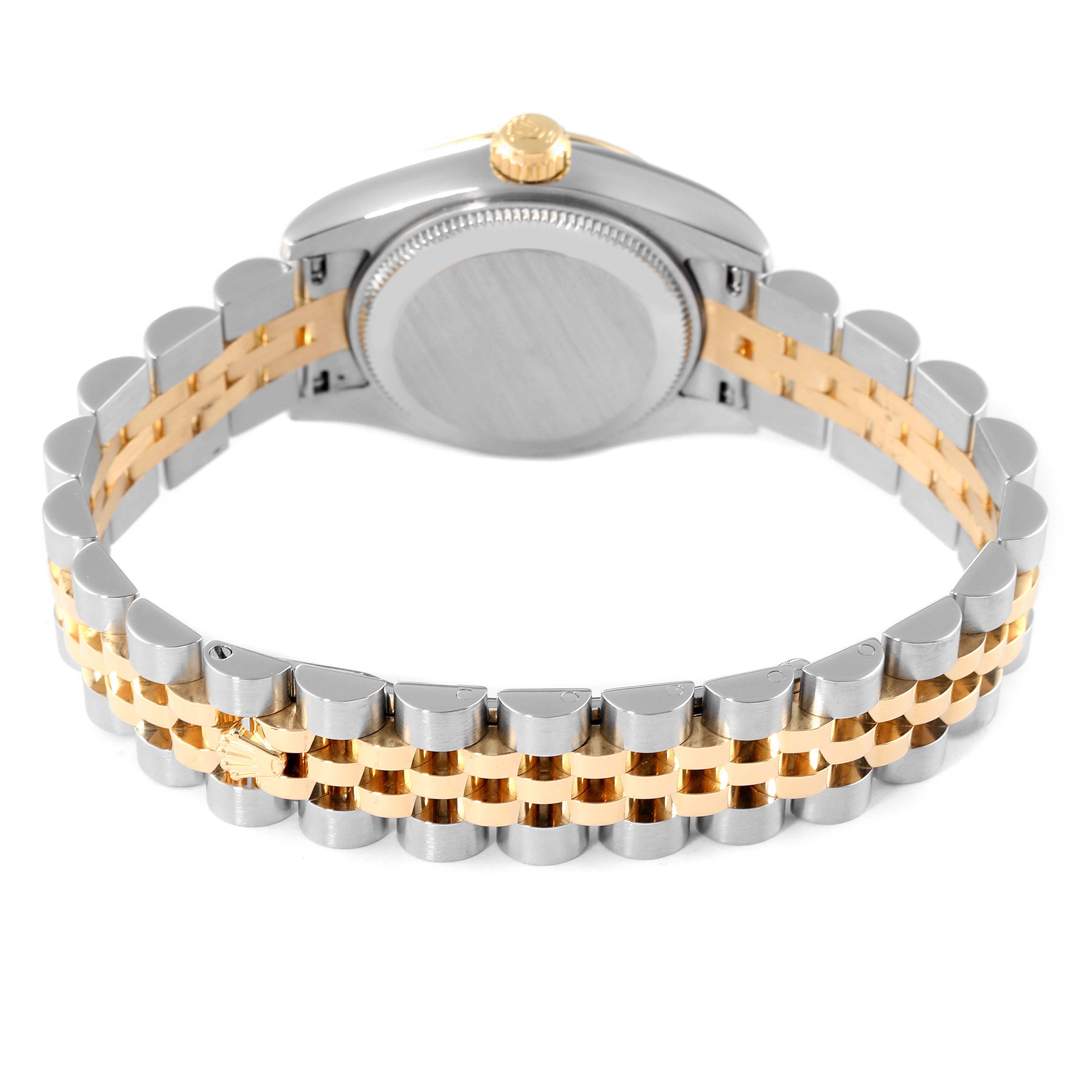 This image shows the backside of the case and bracelet of a Rolex Datejust 179173 Women's Steel and Gold (two tone) Beige Dial 179173 Women's Steel and Gold (two tone) Beige Dial watch, highlighting its two-tone design.