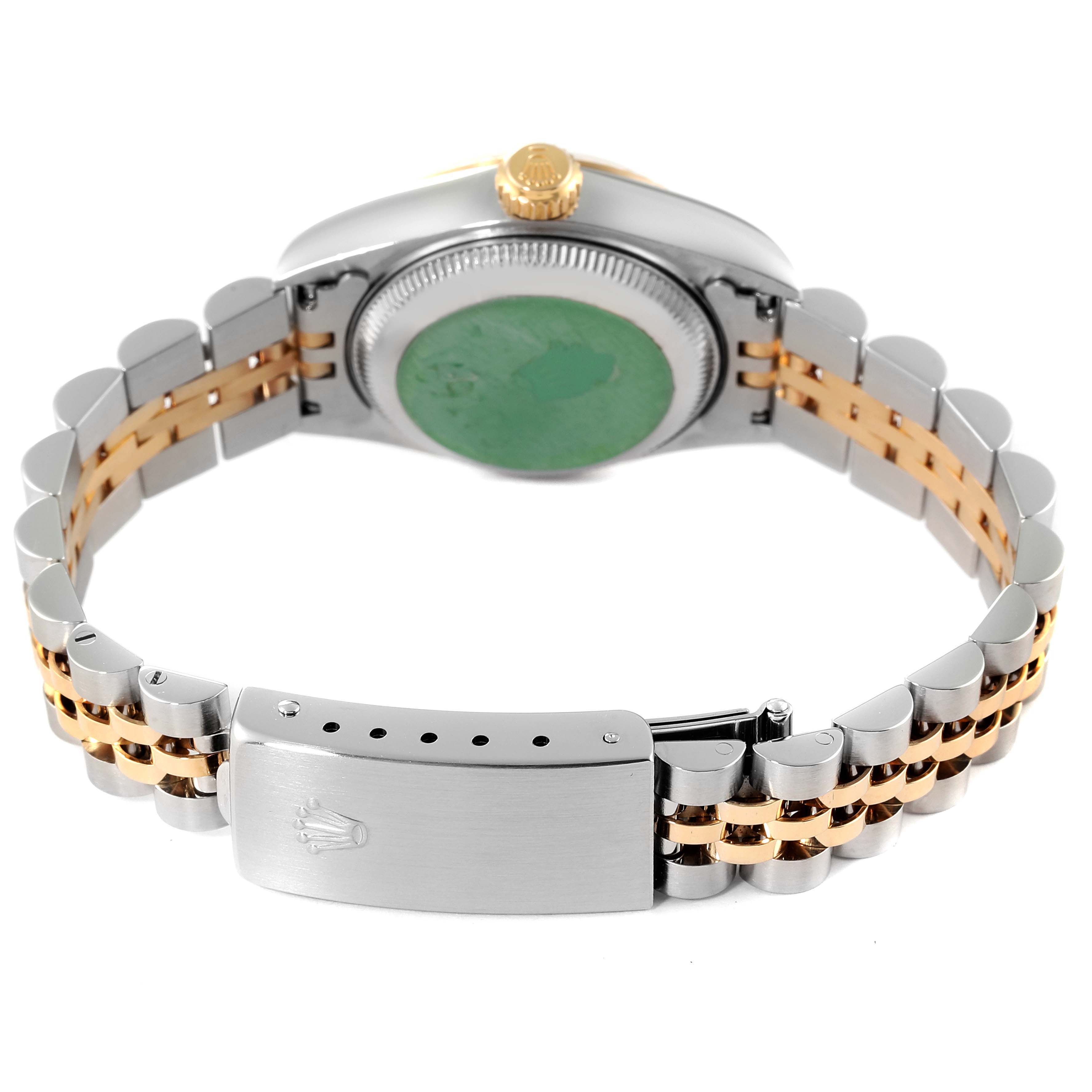 The image shows the back of a Rolex Datejust 69173 Women
s Steel and Gold (two tone) Mother of Pearl Dial 69173 Women
s Steel and Gold (two tone) Mother of Pearl Dial watch and its two-tone bracelet with the clasp open.