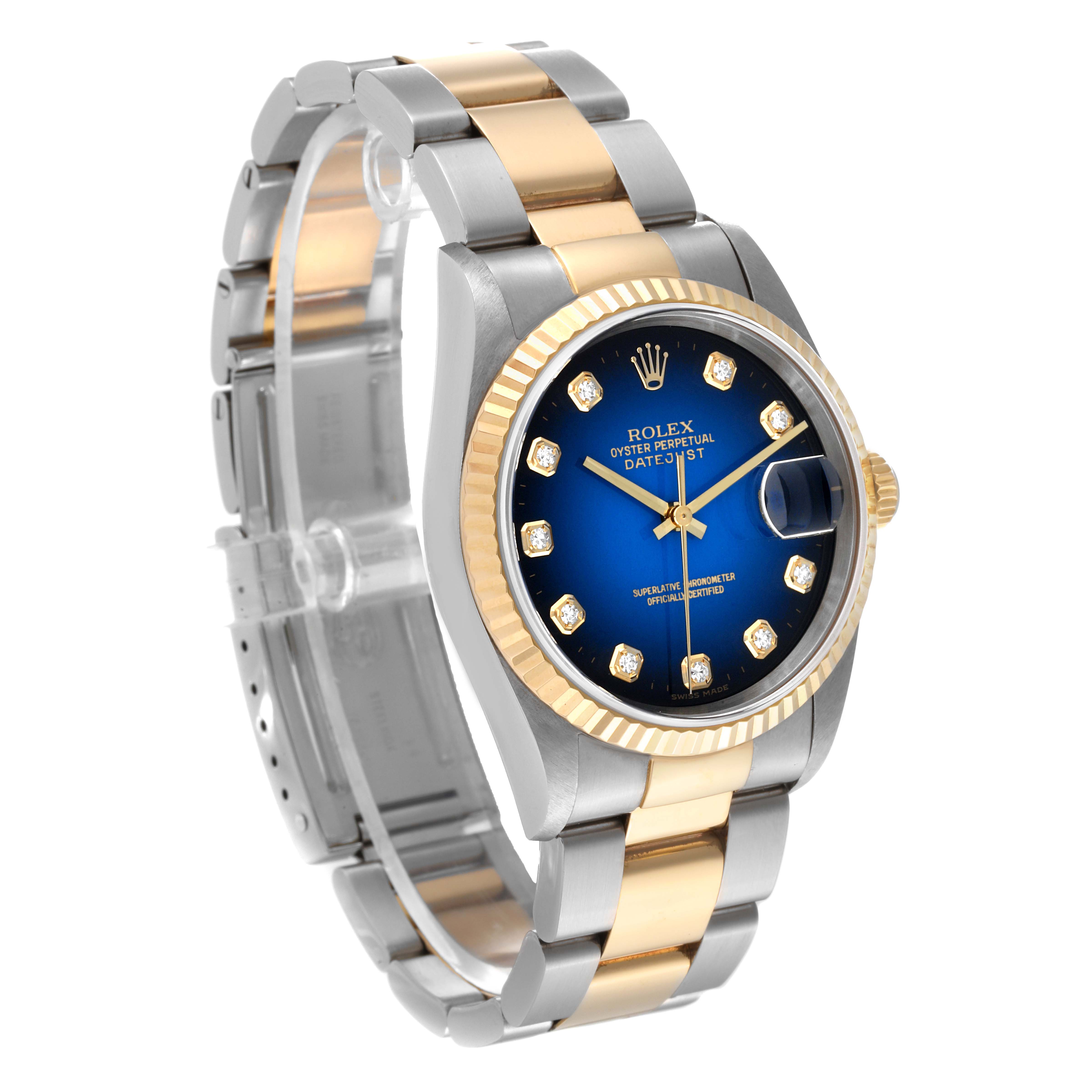 This Rolex Datejust 16233 Men's Steel and Gold (two tone) Blue Dial 16233 Men's Steel and Gold (two tone) Blue Dial watch is shown at a slight angle, displaying its bracelet, case, bezel, dial, and crown.