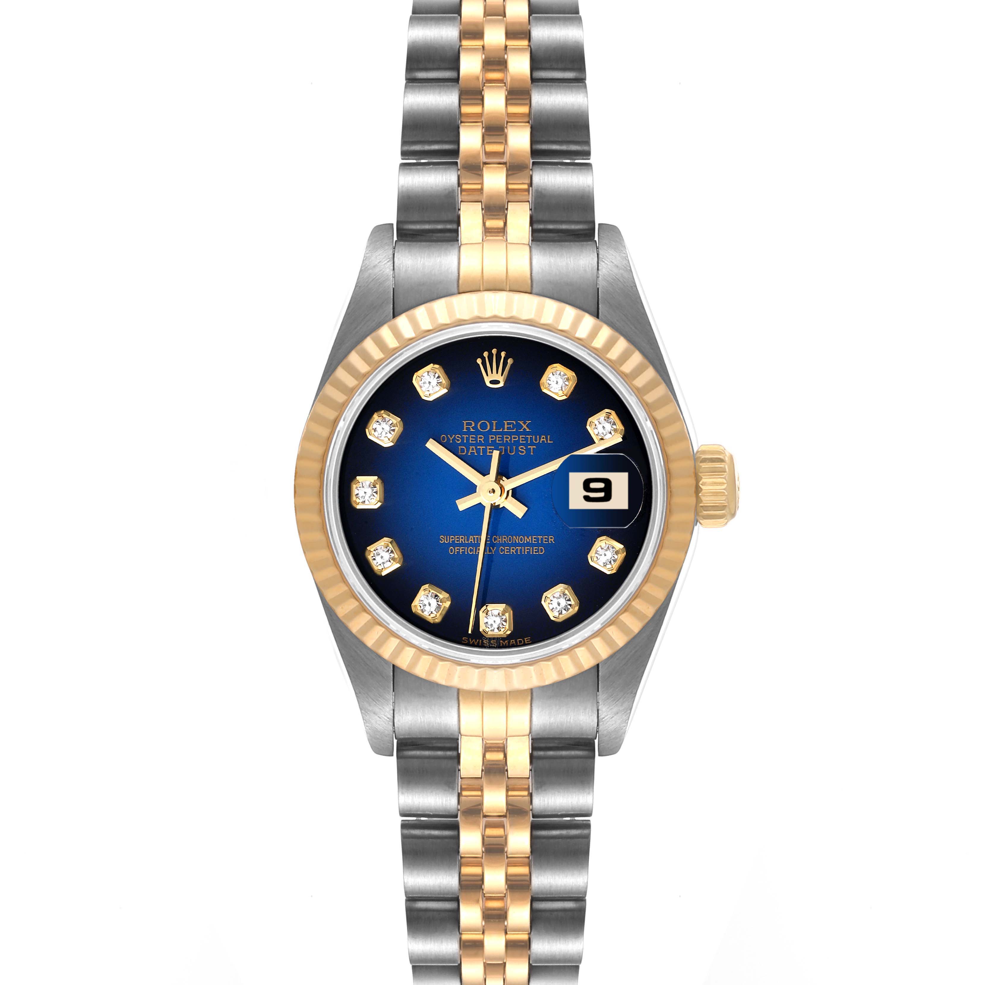 The image shows the Rolex Datejust 79173 Women
s Steel and Gold (two tone) Blue Dial 79173 Women
s Steel and Gold (two tone) Blue Dial watch from a top-down angle, displaying the face, bezel, and bracelet.