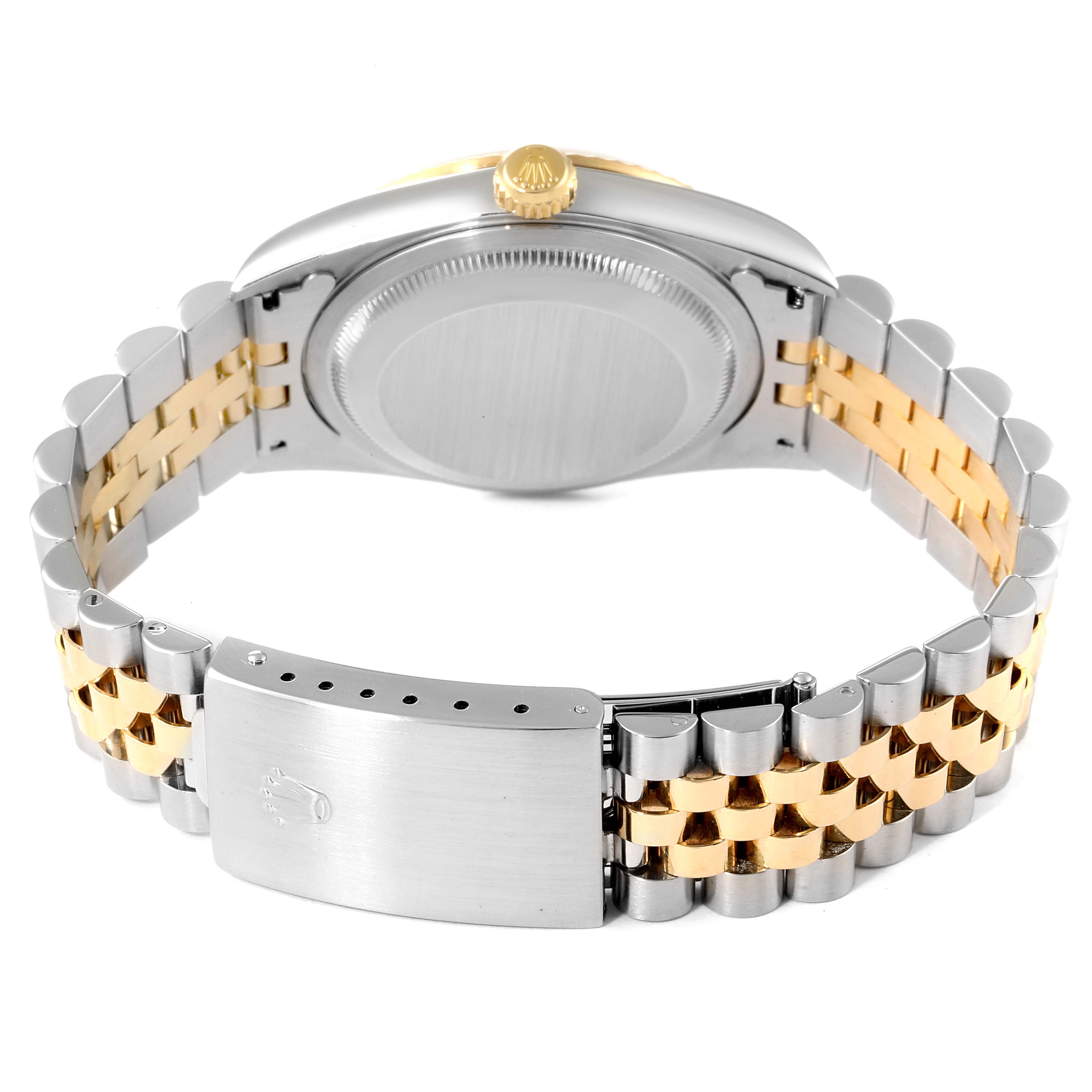 This image shows the backside of a Rolex Datejust 16233 Men's Steel and Gold (two tone) White Dial 16233 Men's Steel and Gold (two tone) White Dial watch and its two-tone jubilee bracelet with the clasp visible.