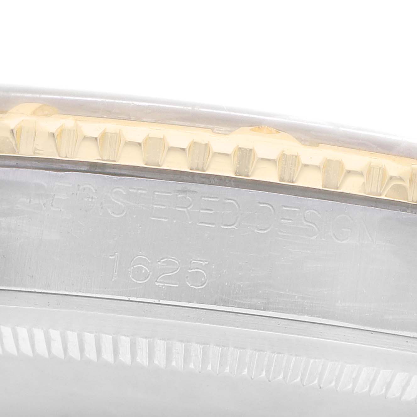 The image shows a close-up of the side of a Rolex Turn-o-Graph 1625 Men
s Steel and Gold (two tone) Champagne Dial watch, highlighting its bezel edge and model number "1625."