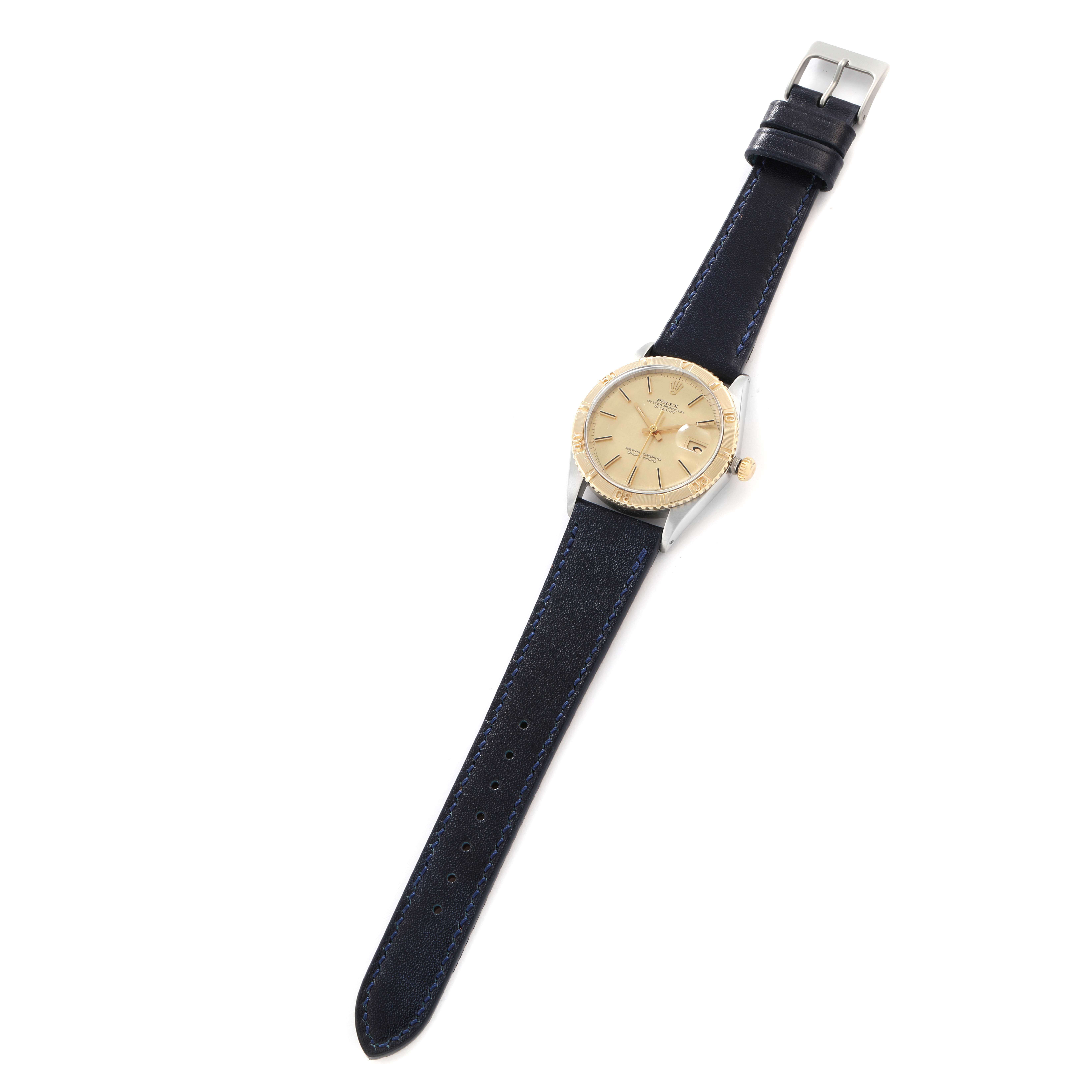 The Rolex Turn-o-Graph 1625 Men
s Steel and Gold (two tone) Champagne Dial watch is shown from a top-down angle, revealing the face, bezel, crown, and strap.