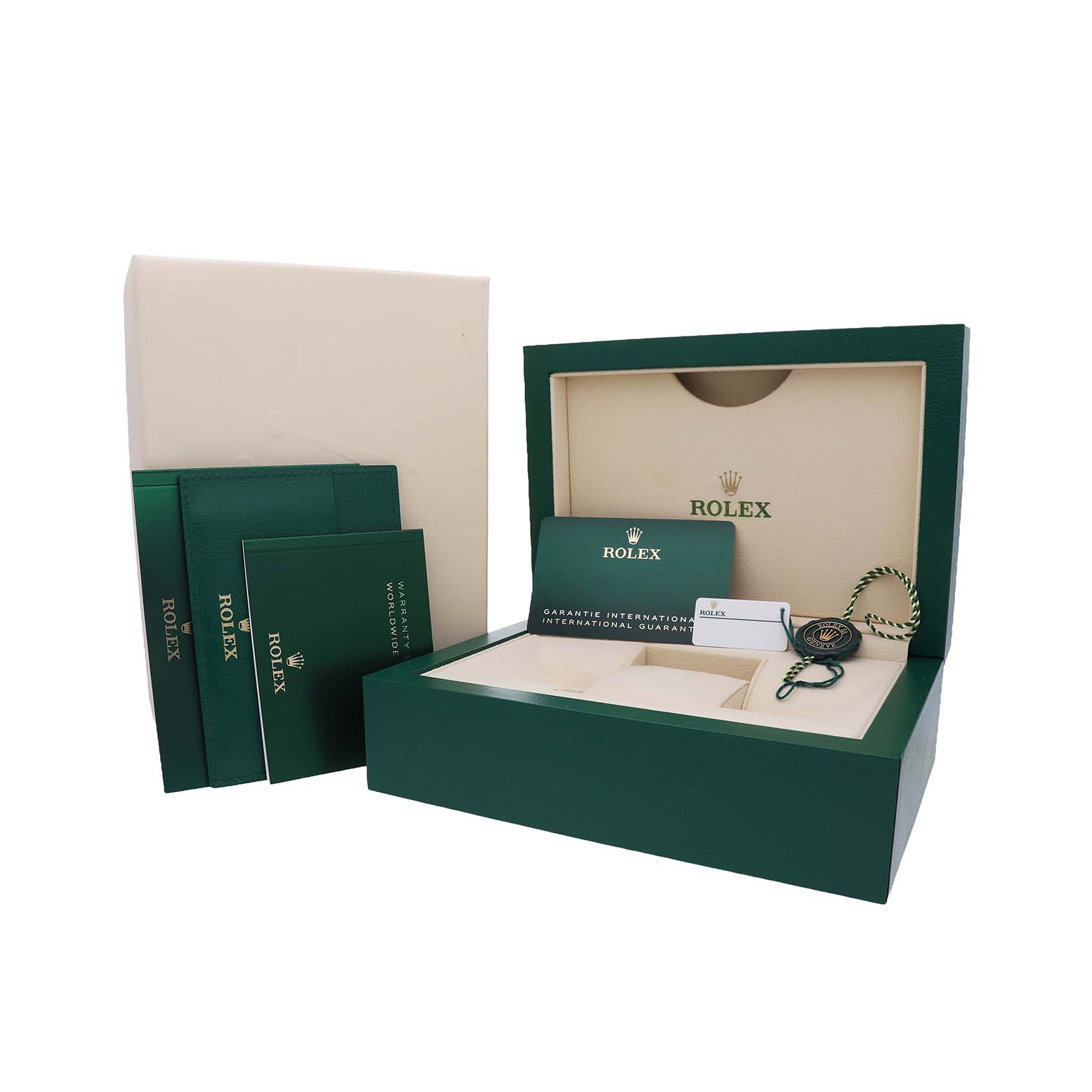 The image shows the packaging and accessories for the Rolex Daytona 116500 Men's Stainless Steel White Dial, including booklets, a box, and a tag.