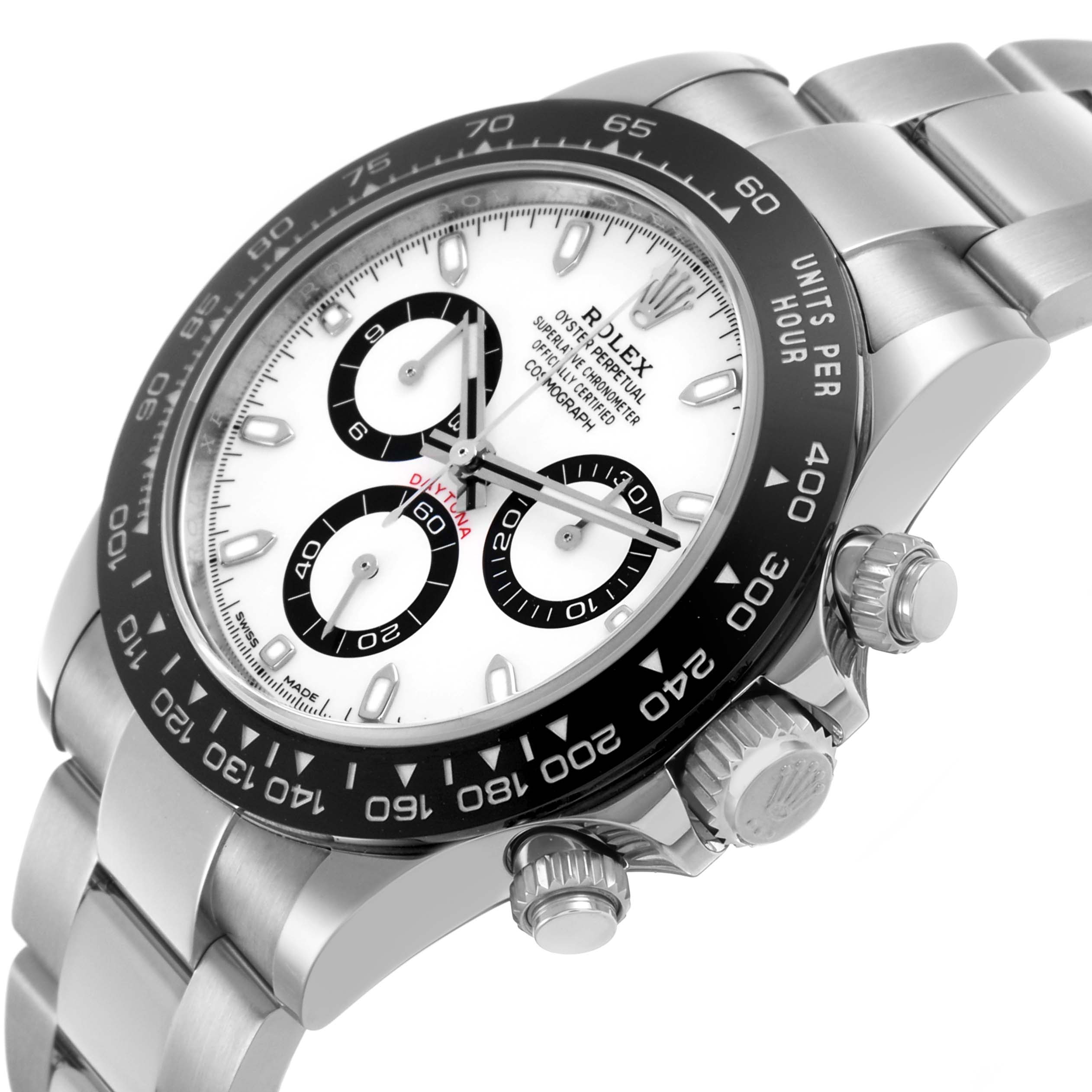 The image shows a Rolex Daytona 116500 Men's Stainless Steel White Dial watch from a front-side angle, highlighting the dial, bezel, crown, and chronograph pushers.