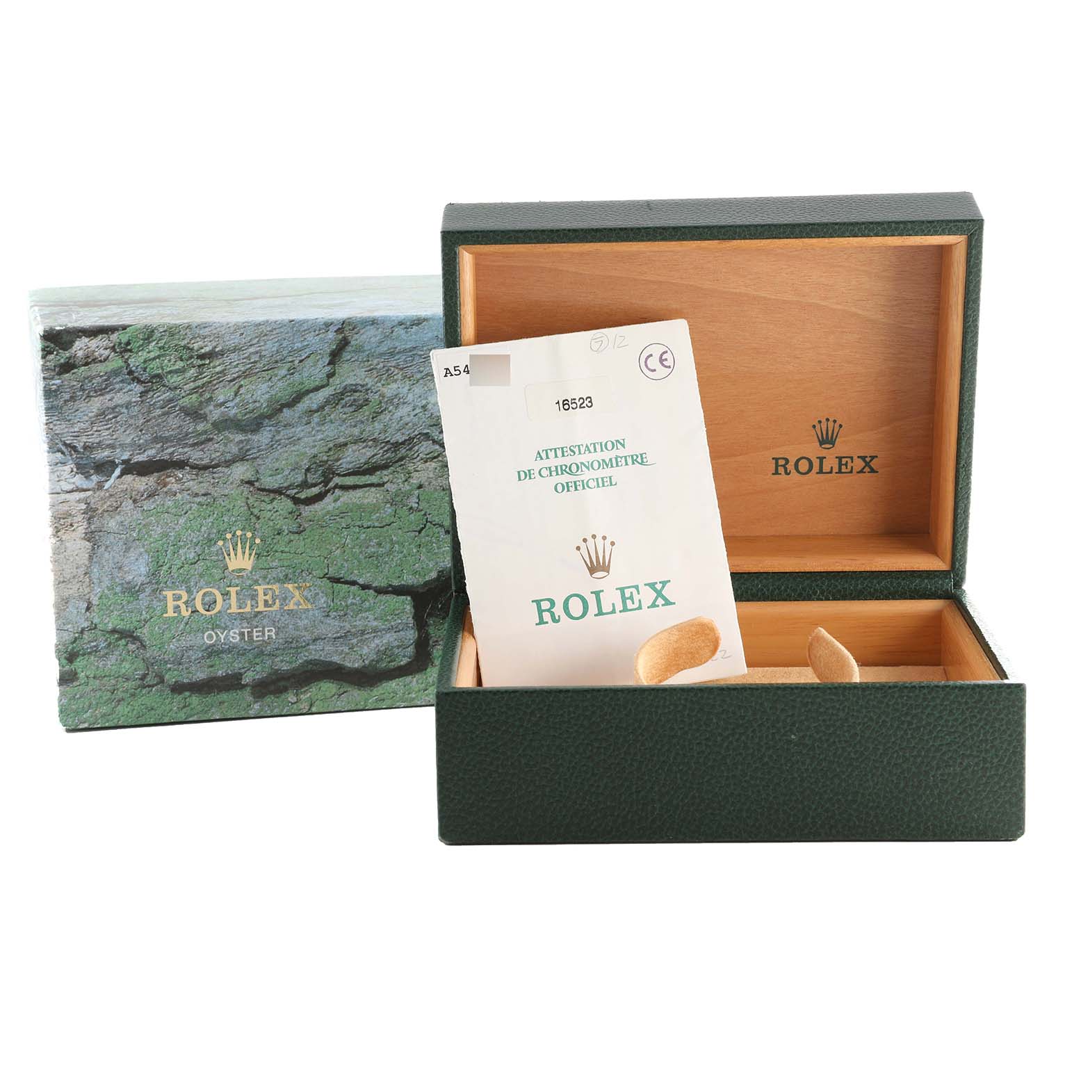 The image shows the open packaging box and certification card for the Rolex Daytona 16523 Men
s Steel and Gold (two tone) White Dial 16523 Men
s Steel and Gold (two tone) White Dial watch.