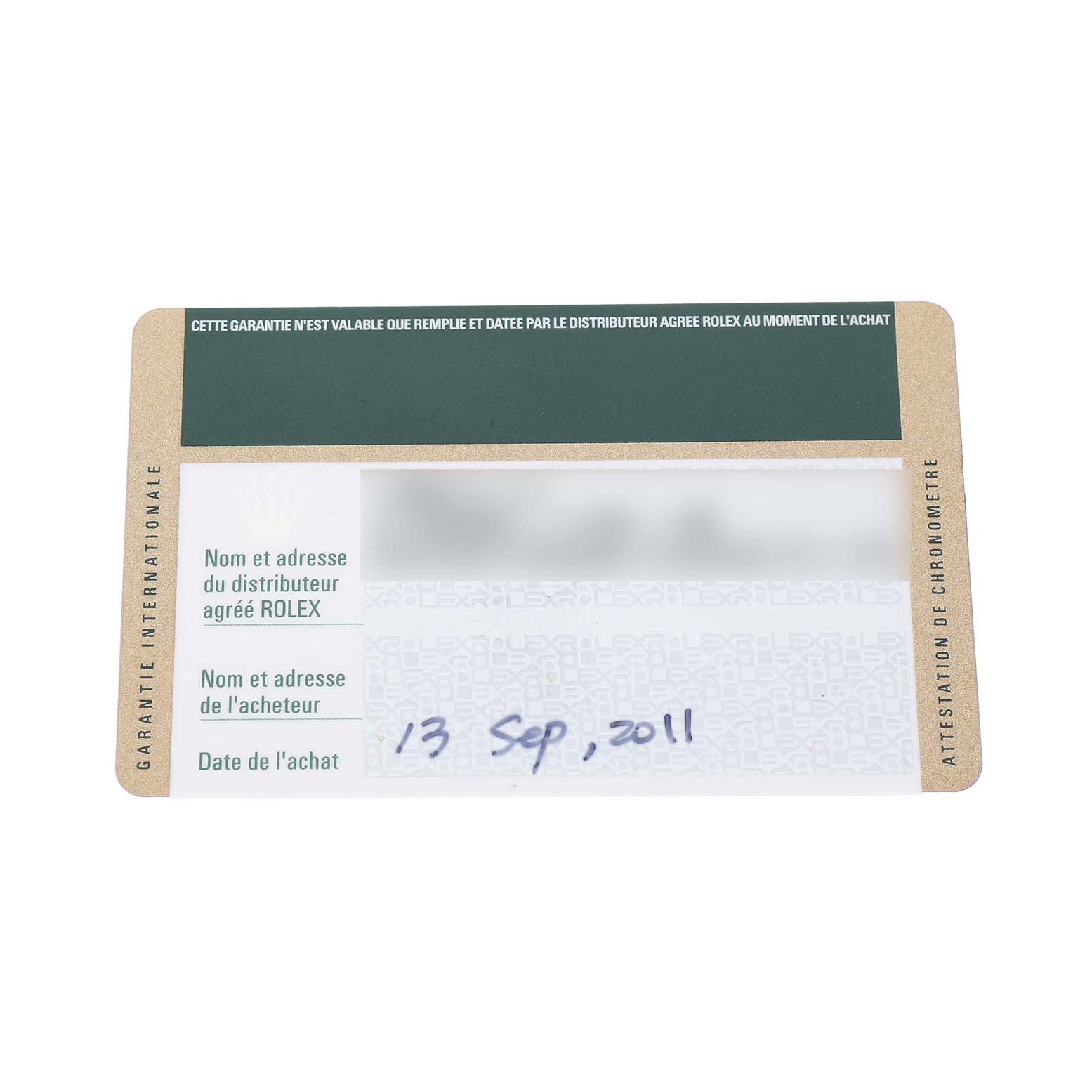 The image shows a Rolex warranty card for the Explorer model, displaying purchase details and brand information.