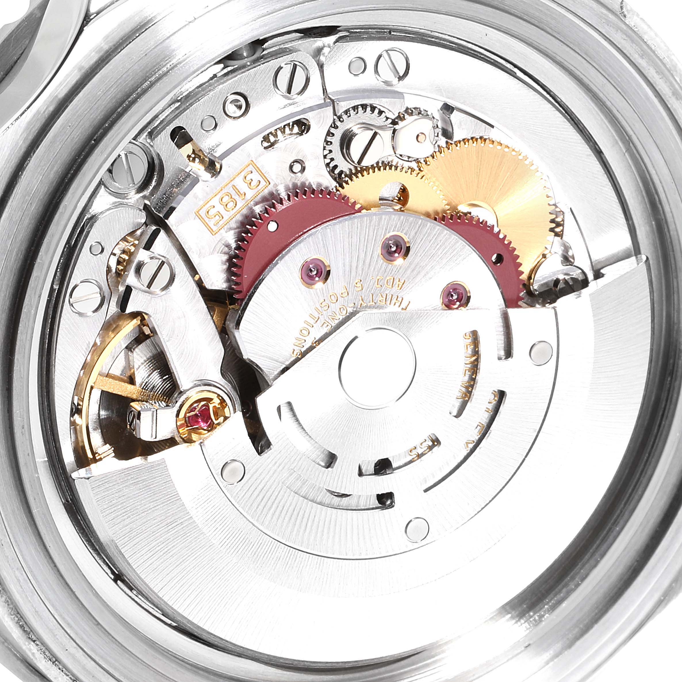 This close-up image shows the intricate inner mechanism and gears of a Rolex GMT-Master 16710 Men's Stainless Steel Black Dial 16710 Men's Stainless Steel Black Dial watch.