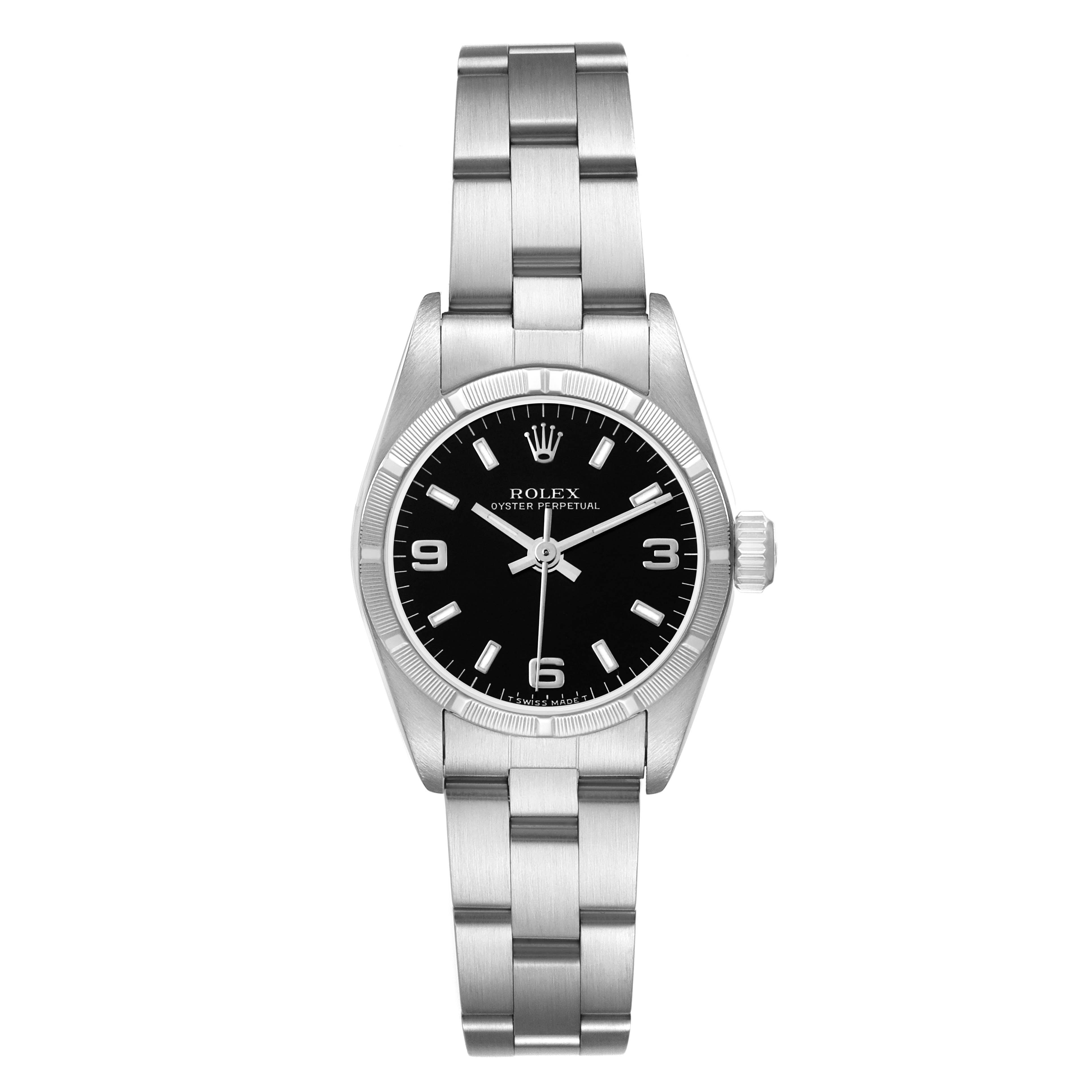 The Rolex Oyster Perpetual 67230 Women
s Stainless Steel Black Dial watch is shown from the front, displaying the dial, bezel, and metal bracelet.