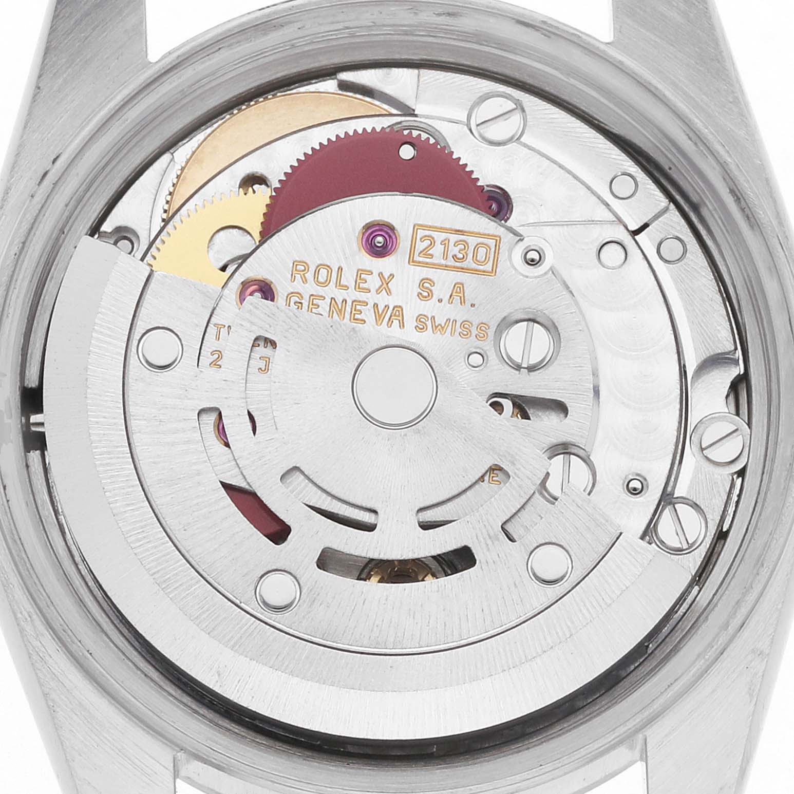 The image shows the movement of a Rolex Oyster Perpetual 67230 Women
s Stainless Steel Black Dial model from a top-down angle, highlighting its intricate components.