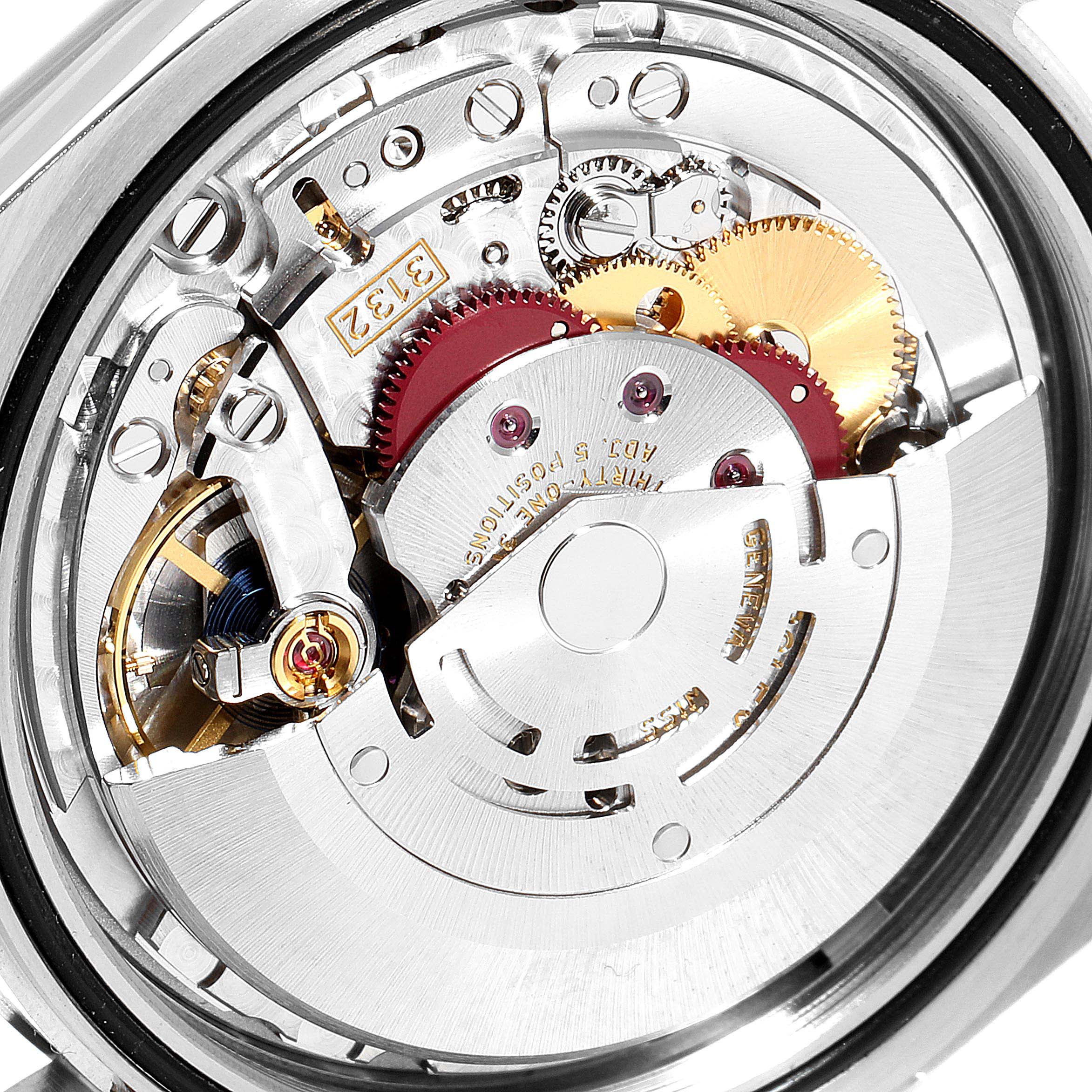 The image shows the internal mechanism of a Rolex Oyster Perpetual 114300 Men's Stainless Steel Silver Dial 114300 Men's Stainless Steel Silver Dial watch from a close-up view.
