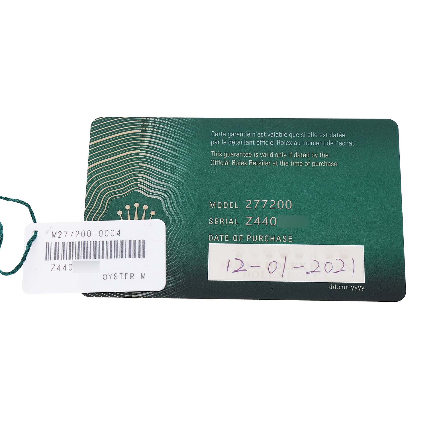 The image shows the warranty card and tag for a Rolex Mid-Size 277200 Women's Stainless Steel Pink Dial model 277200.