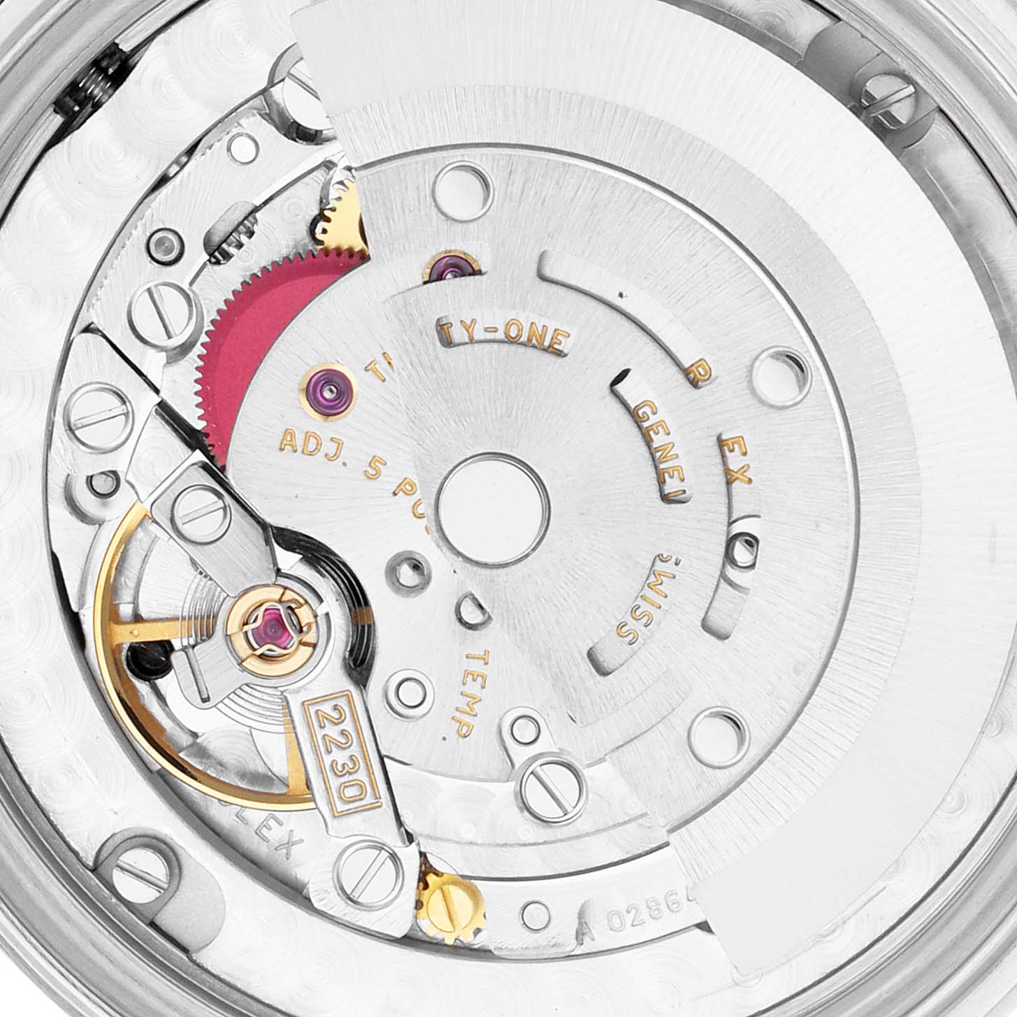 The image shows the internal movement of the Rolex Oyster Perpetual 77014 Women
s Stainless Steel Black Dial watch, including gears and the rotor from a top-down angle.