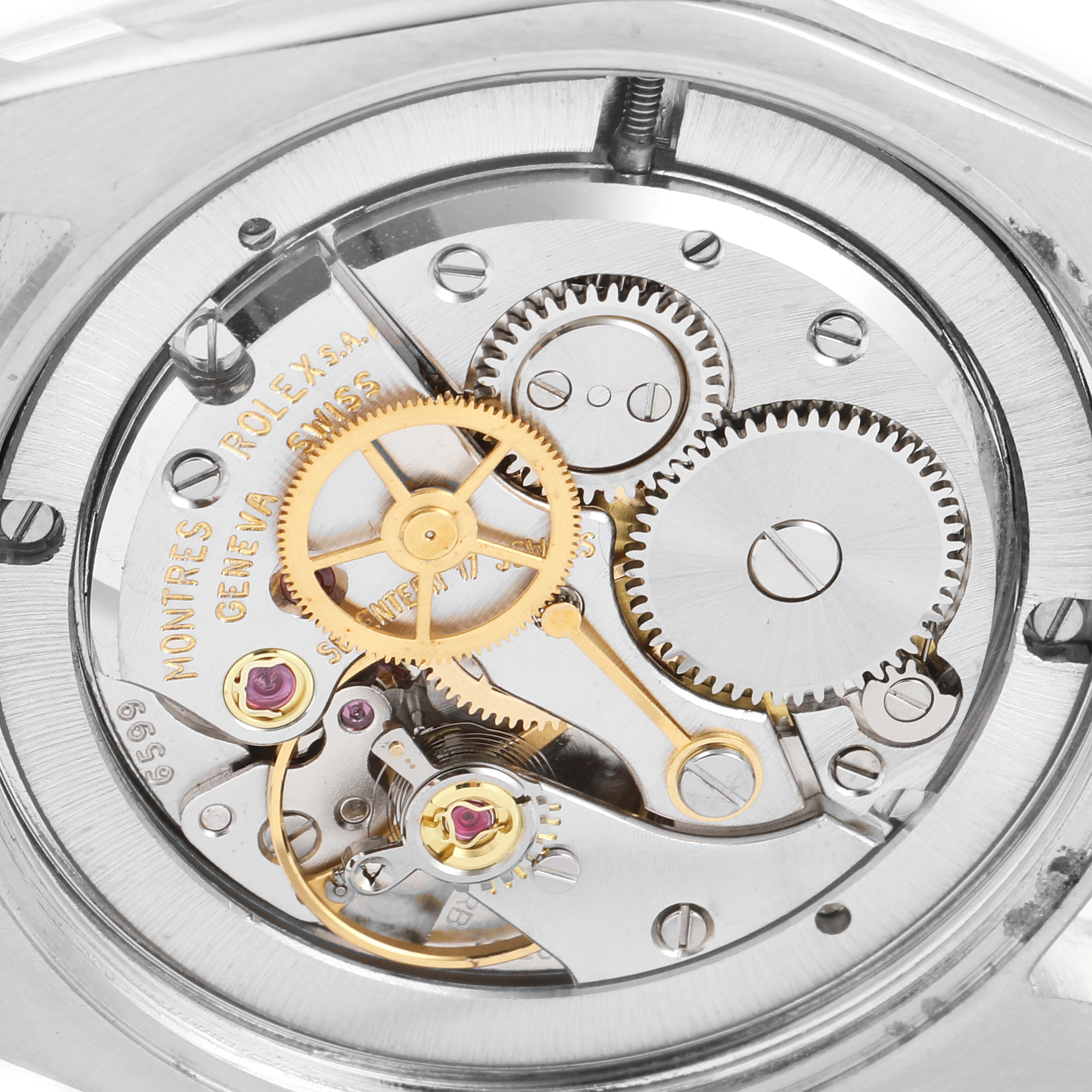 The image shows a close-up view of the internal mechanics of the Rolex Vintage Collection 6694 Men's Stainless Steel Silver Dial 6694 Men's Stainless Steel Silver Dial watch.