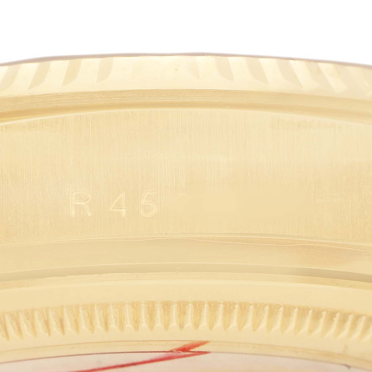 The image shows a close-up of the bezel and case edge of a Rolex President 18038 Men's Yellow Gold Champagne Dial watch, highlighting its gold finish and engraved details.