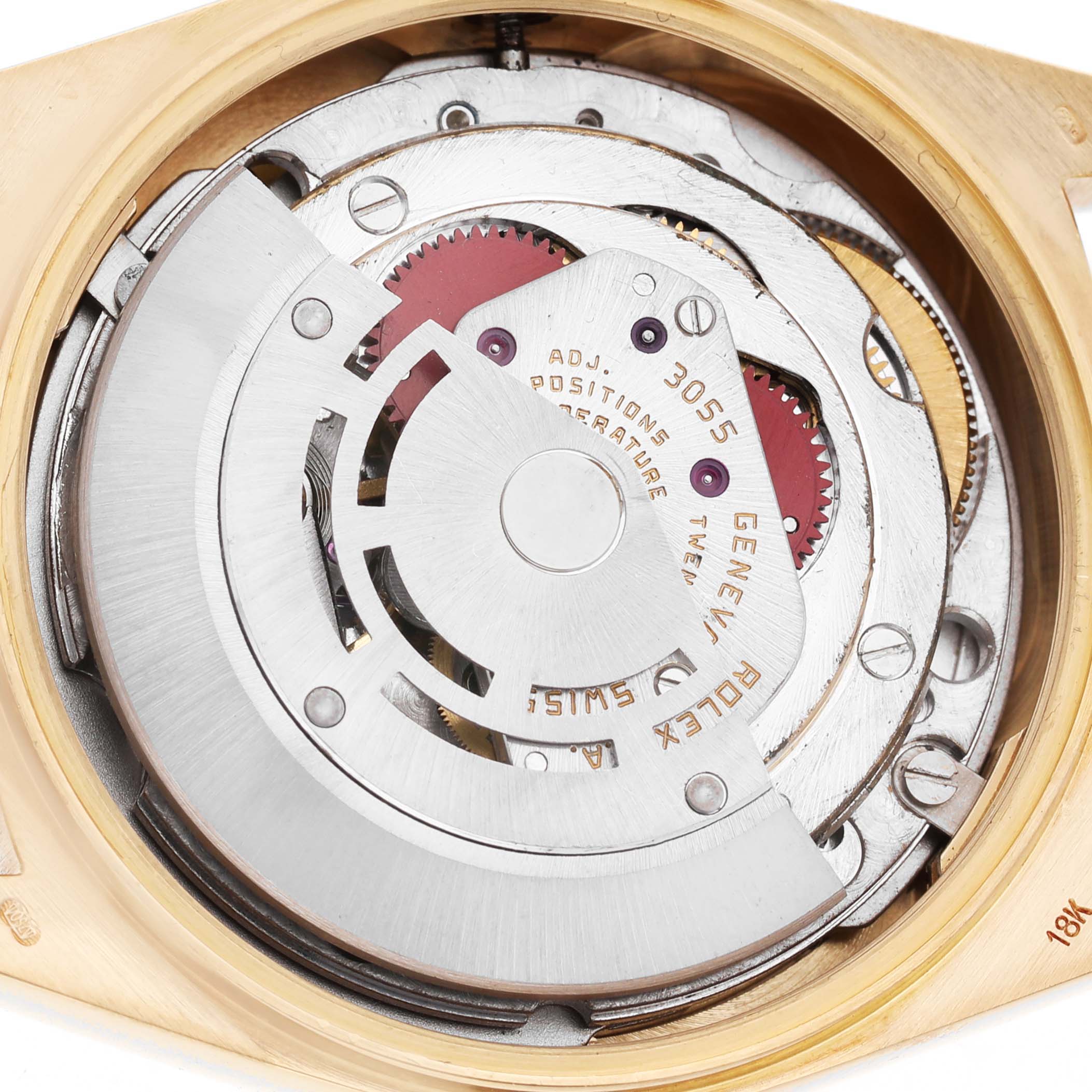 The image shows the intricate movement of a Rolex President 18038 Men's Yellow Gold Champagne Dial model watch at a top-down angle.