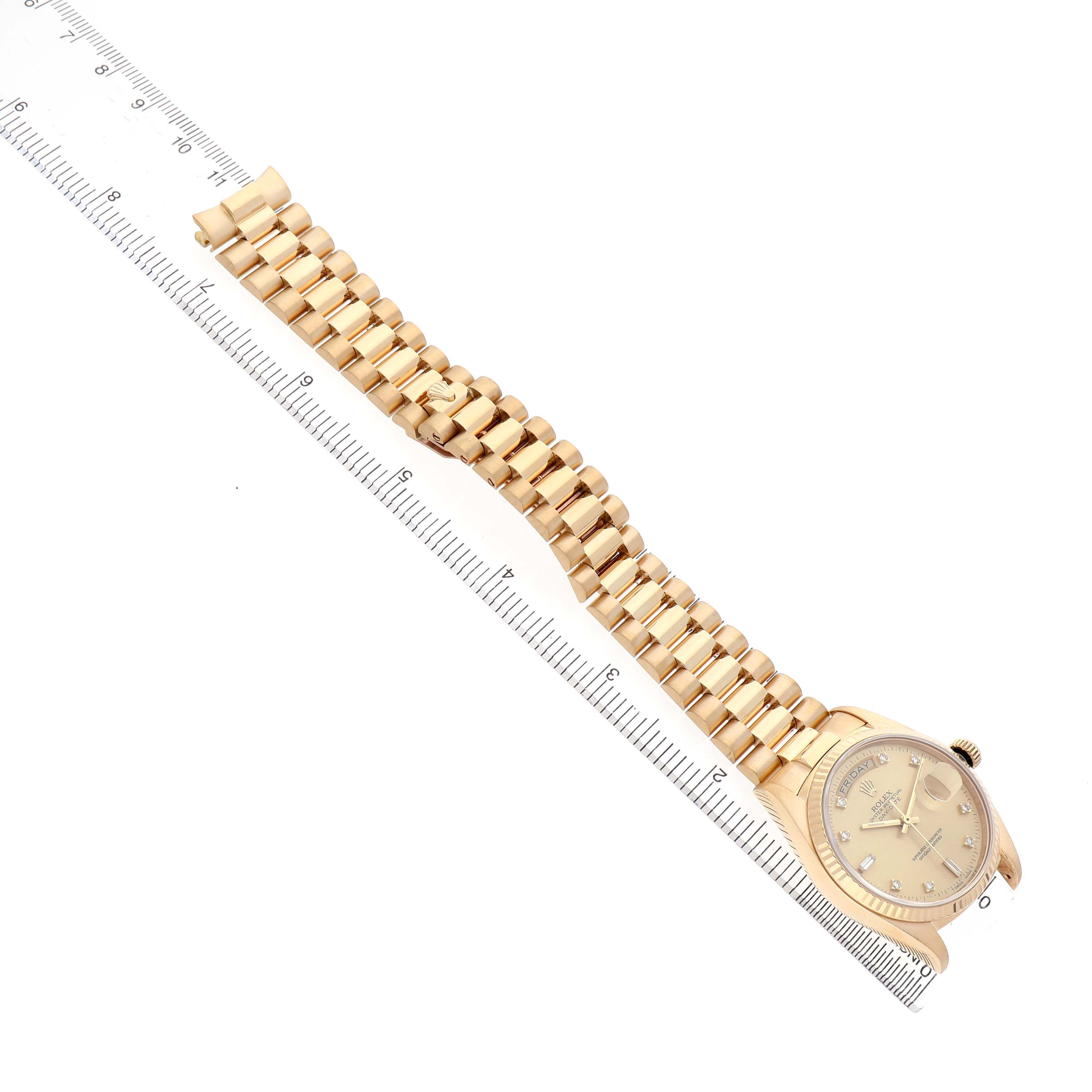 The Rolex President 18038 Men's Yellow Gold Champagne Dial model is shown from an angled top view, highlighting the watch face and gold bracelet.