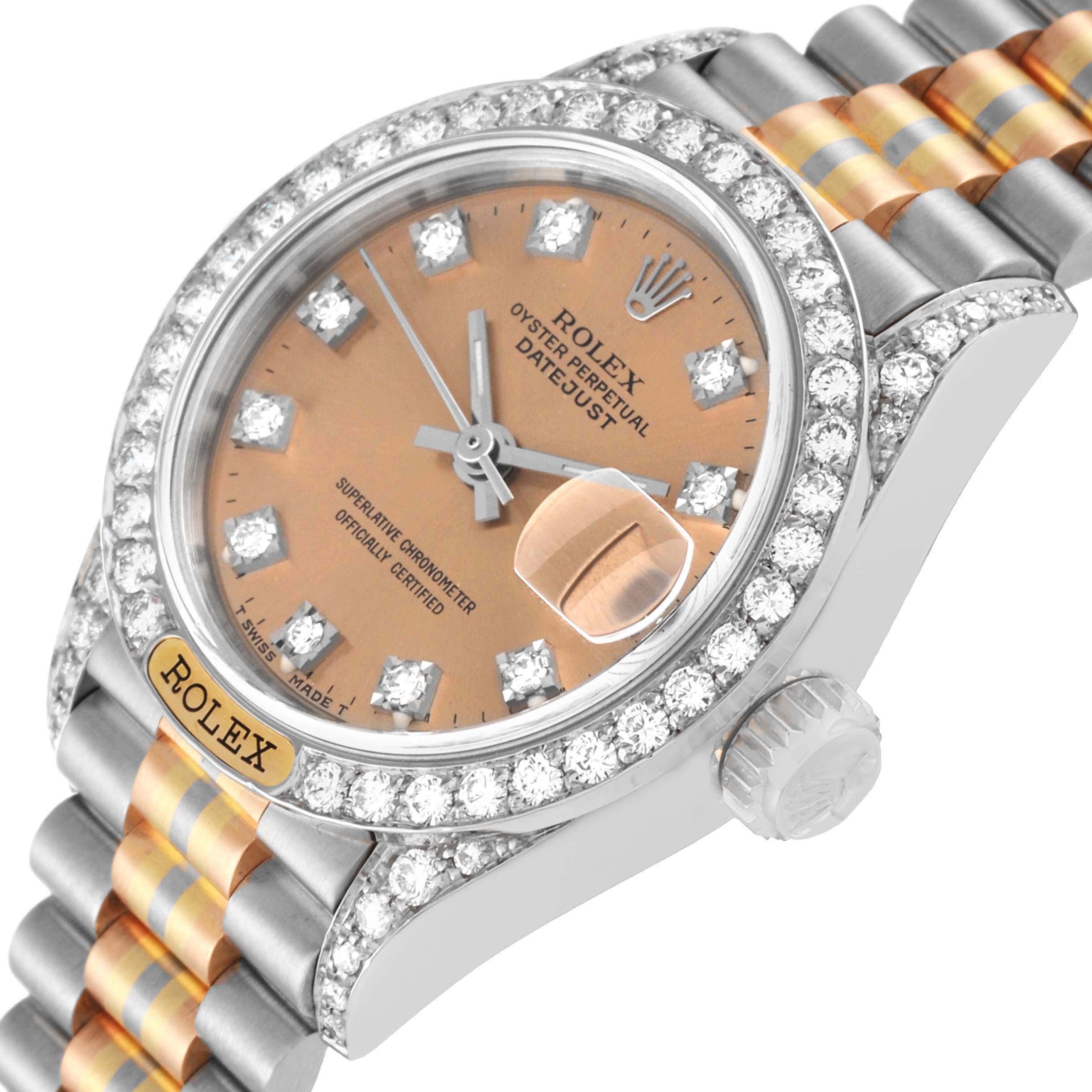 The image shows a Rolex President 69159 Women's Steel and Gold (two tone) Champagne Dial 69159 Women's Steel and Gold (two tone) Champagne Dial Datejust watch, highlighting the diamond bezel, dial, and two-tone bracelet at a slight angle.