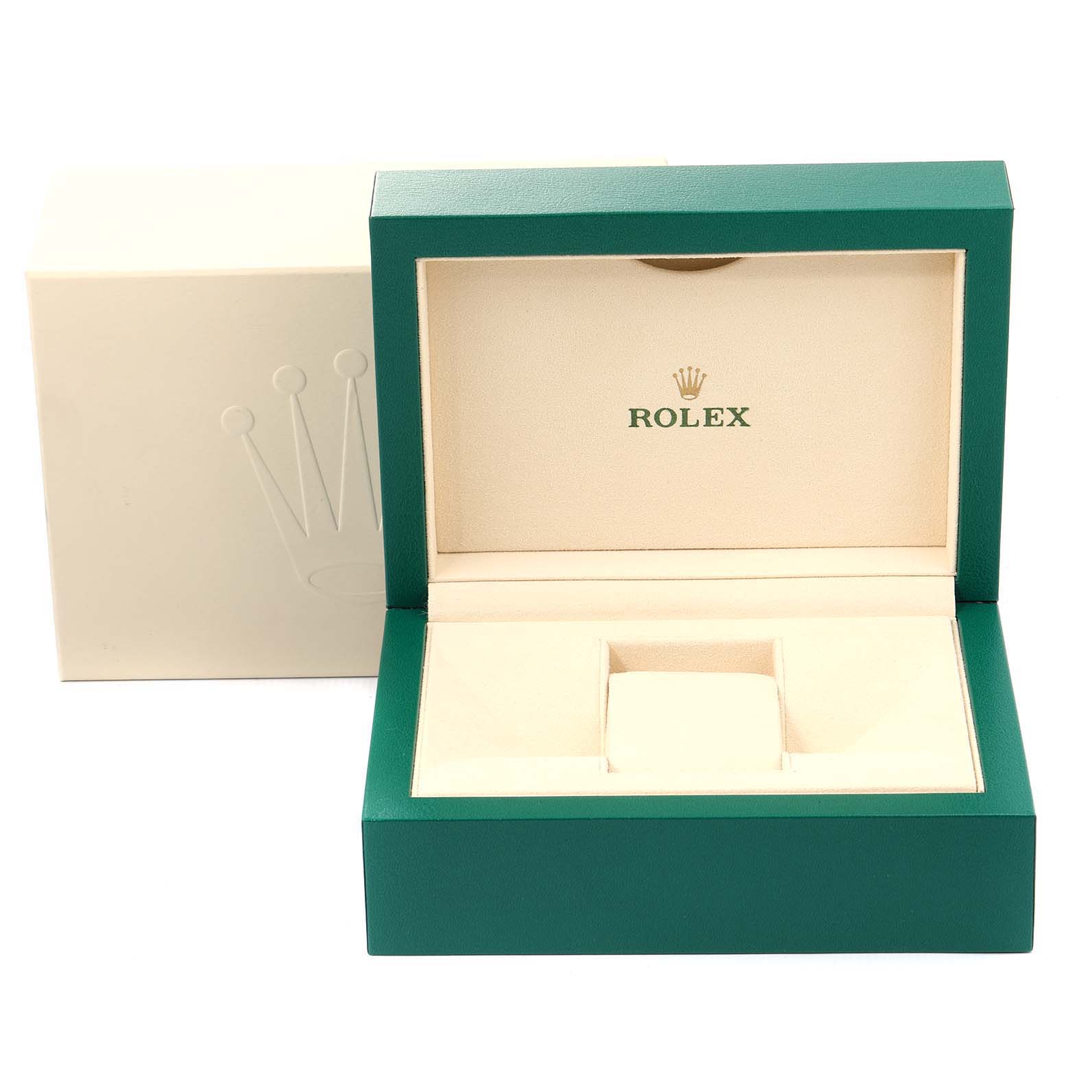 The image shows the open box for a Rolex Submariner 114060 Men's Stainless Steel Black Dial 114060 Men's Stainless Steel Black Dial watch, featuring a green exterior and cream interior.