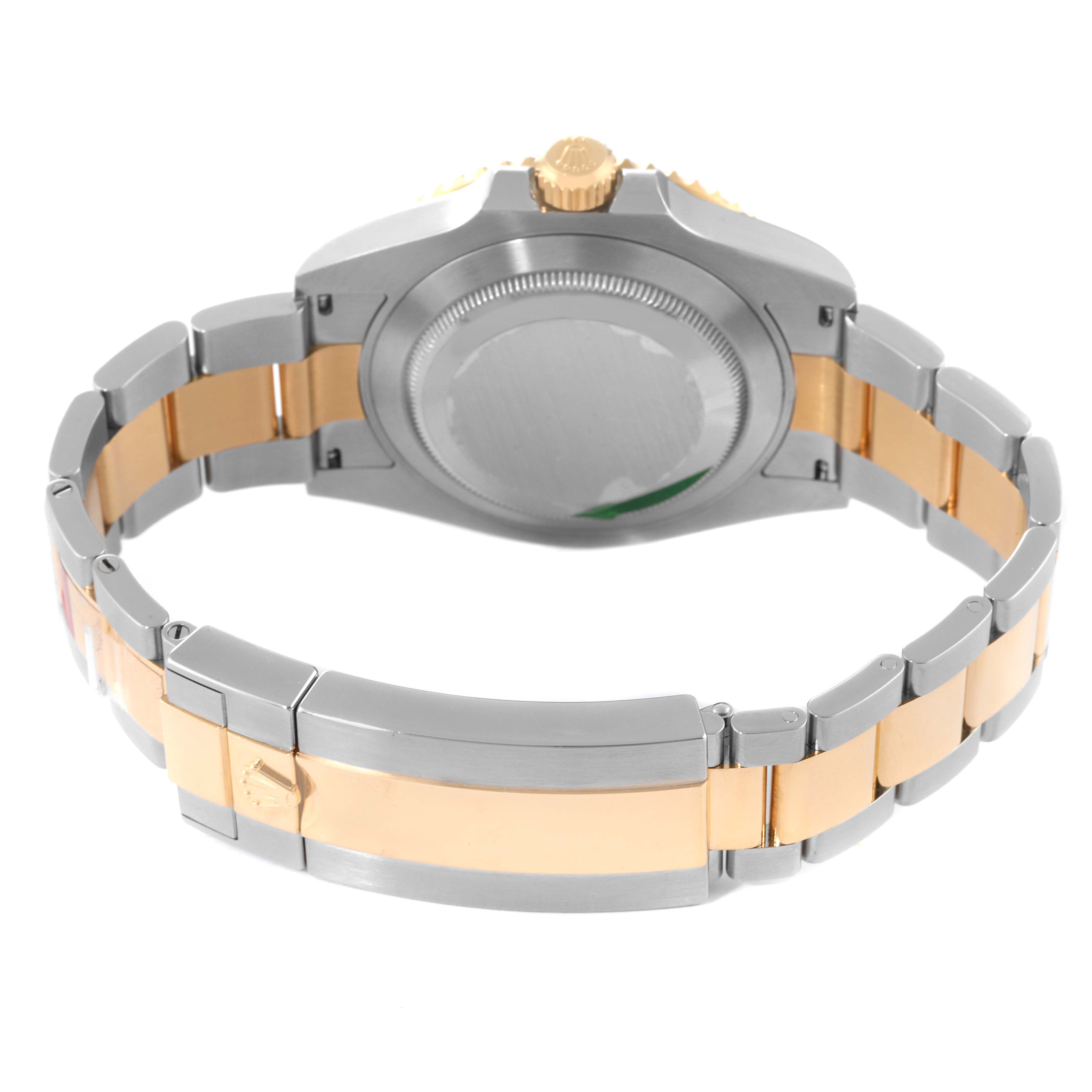 This image shows the case back and bracelet of a Rolex Submariner 126613 Men's Steel and Gold (two tone) Blue Dial 126613 Men's Steel and Gold (two tone) Blue Dial watch, viewed from the rear.